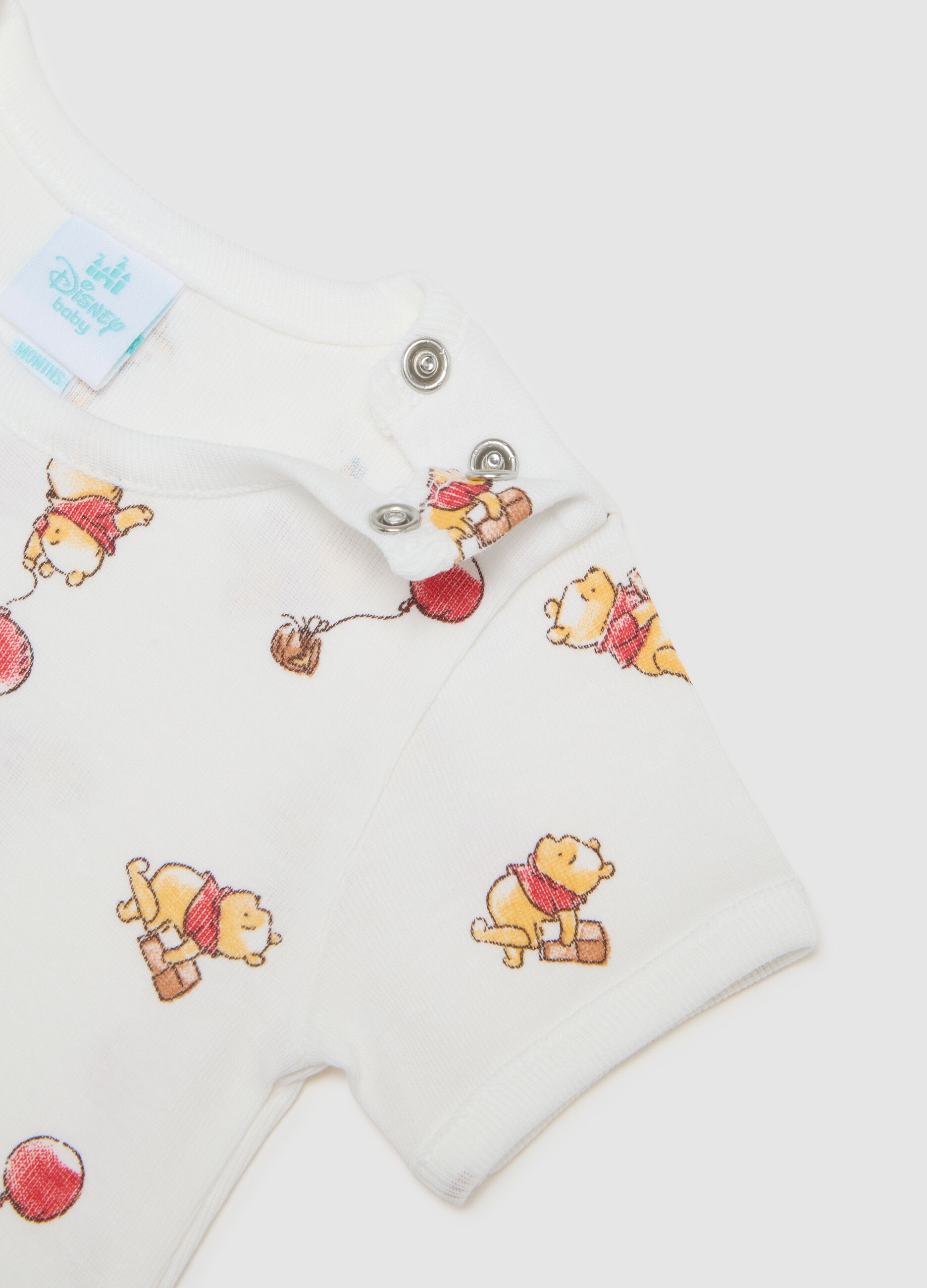 Set of two white newborn bodysuits in pure cotton