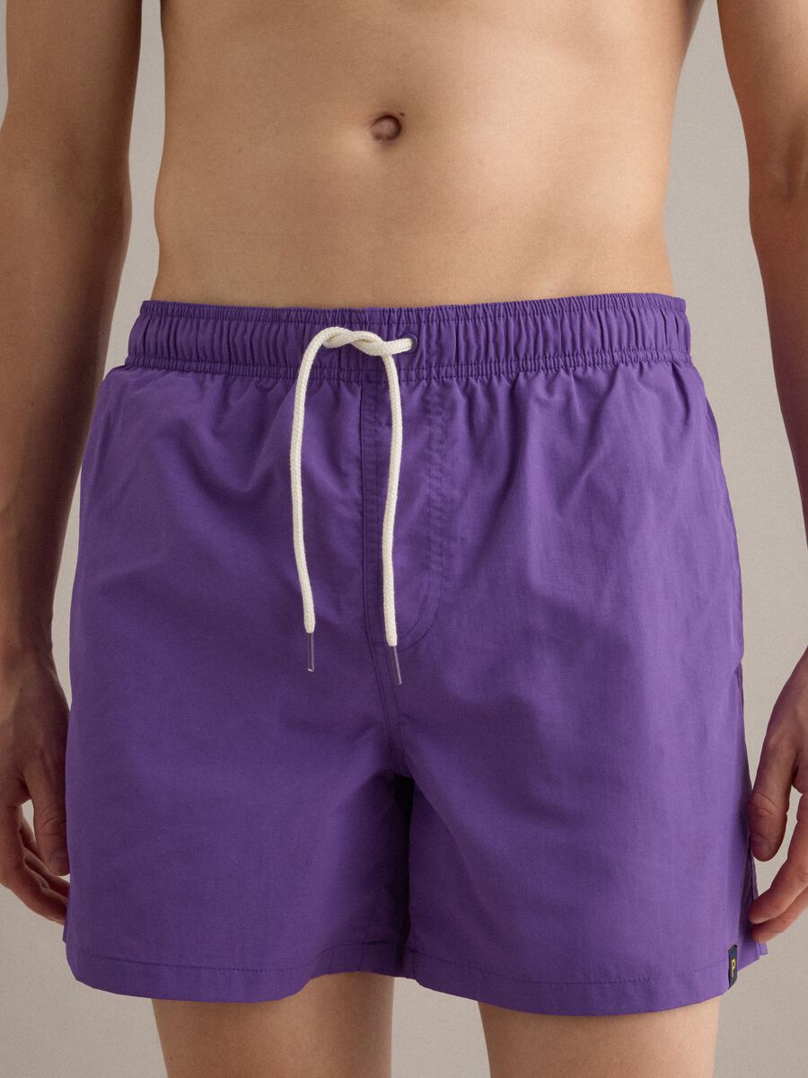 Boxer da mare viola con vita elasticizzata e coulisse_1