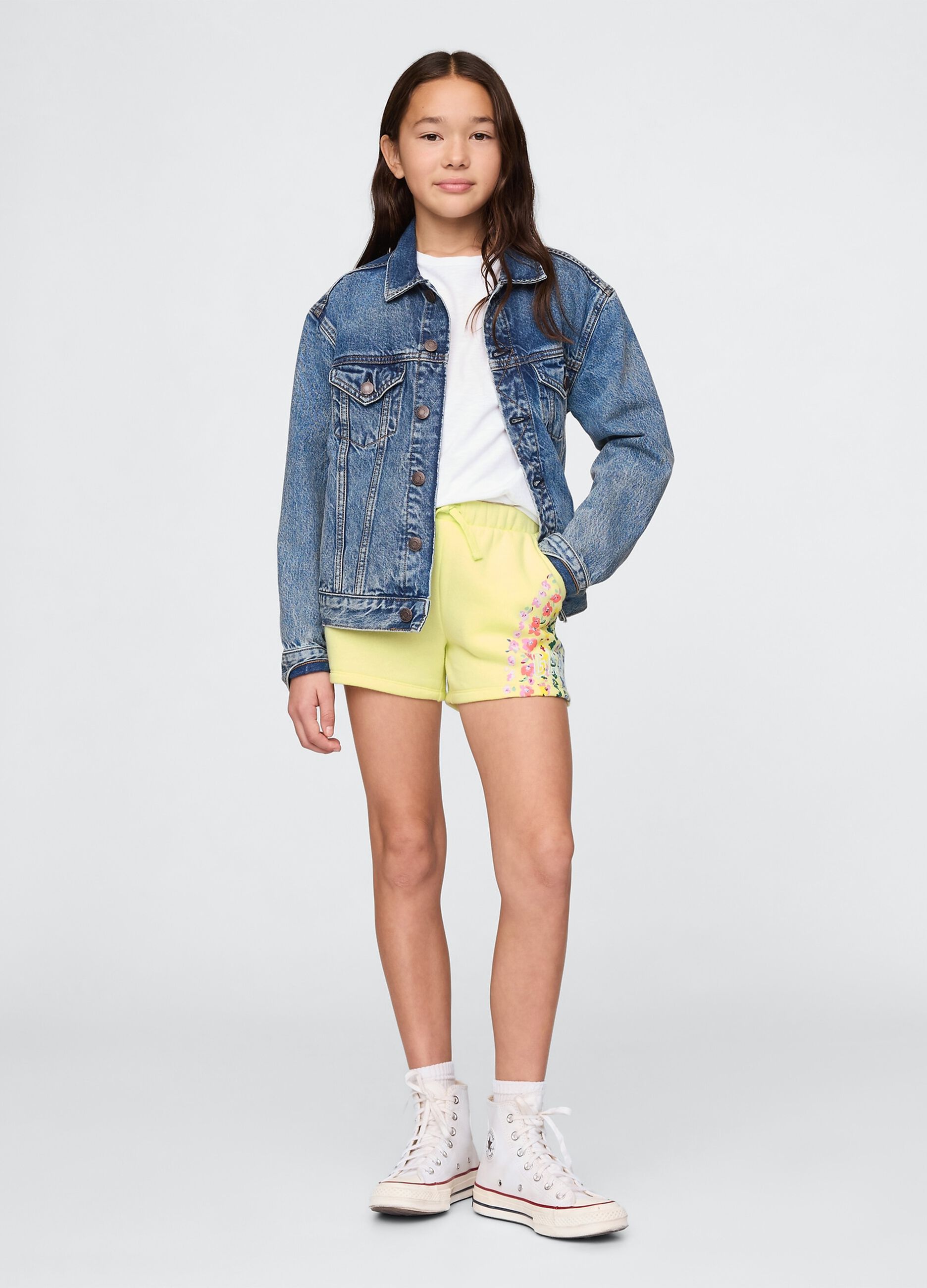 Yellow shorts with floral details for girls