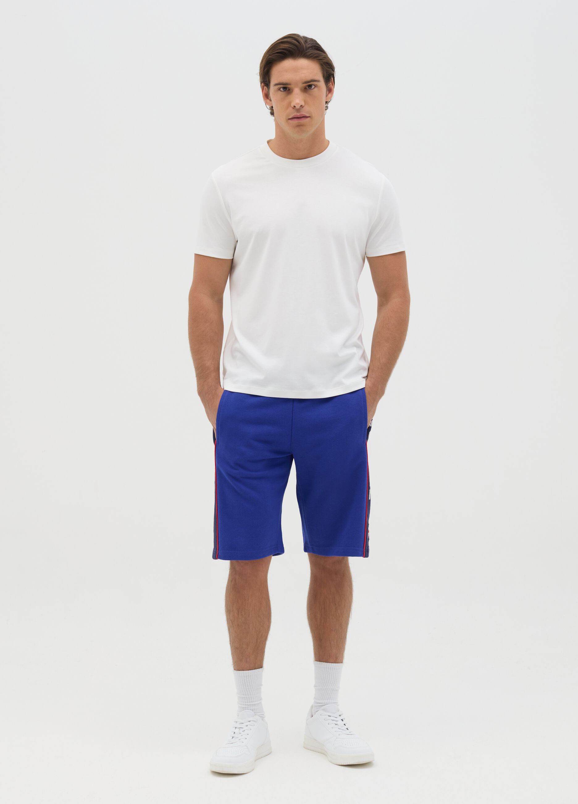 Blue sports Bermuda shorts with logo