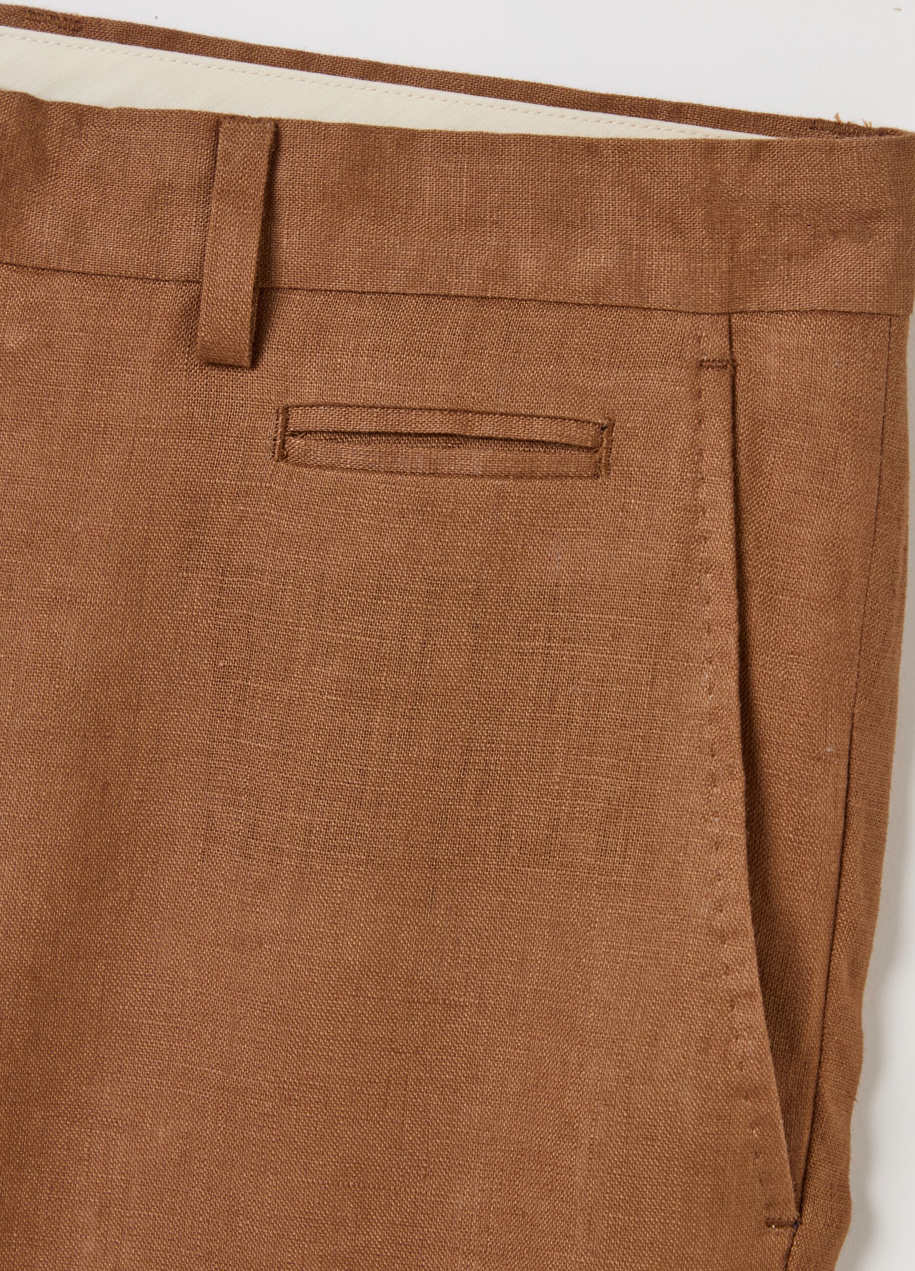 Contemporary slim-fit trousers in linen