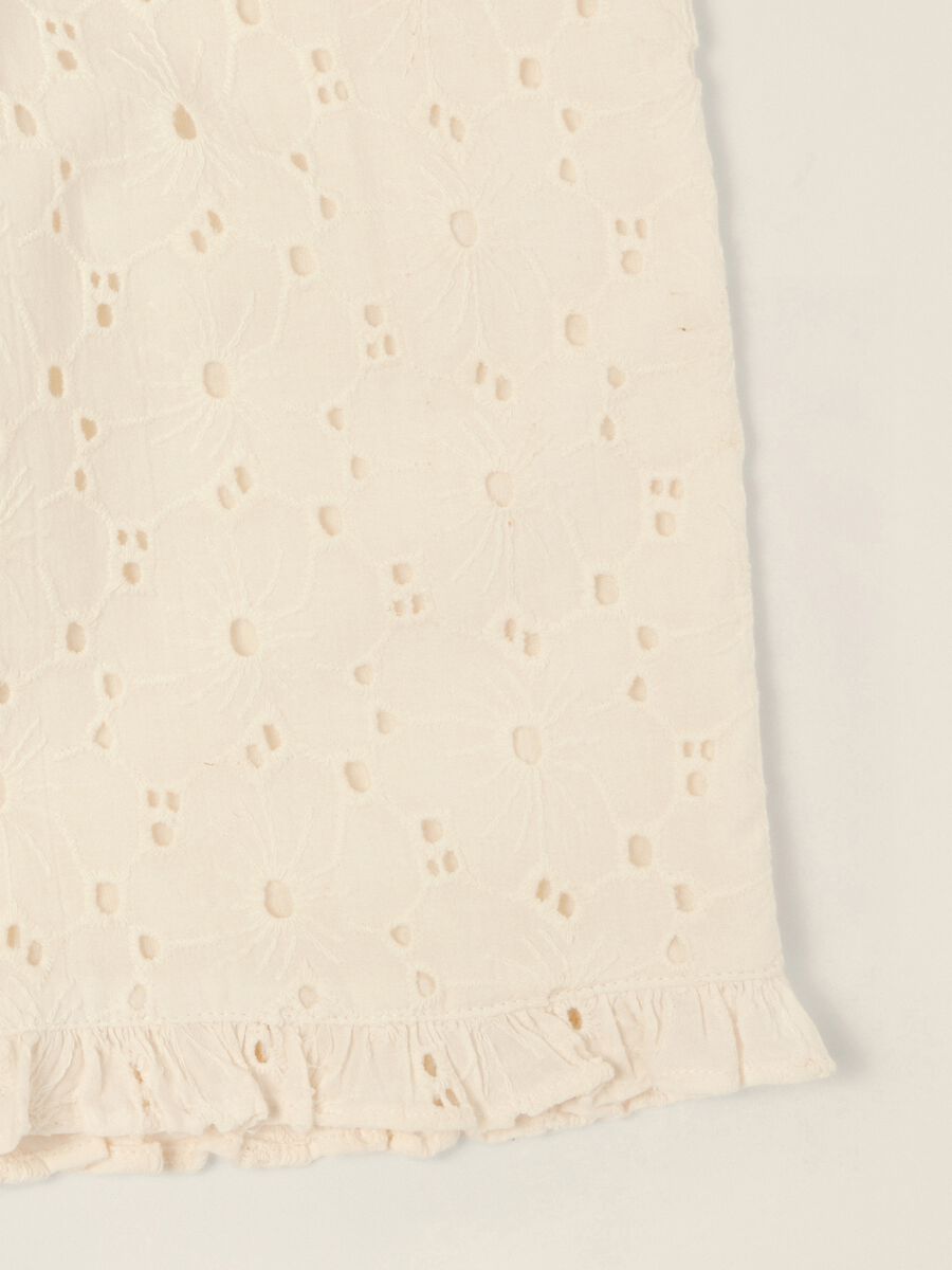 White broderie cotton trousers for baby girls_1