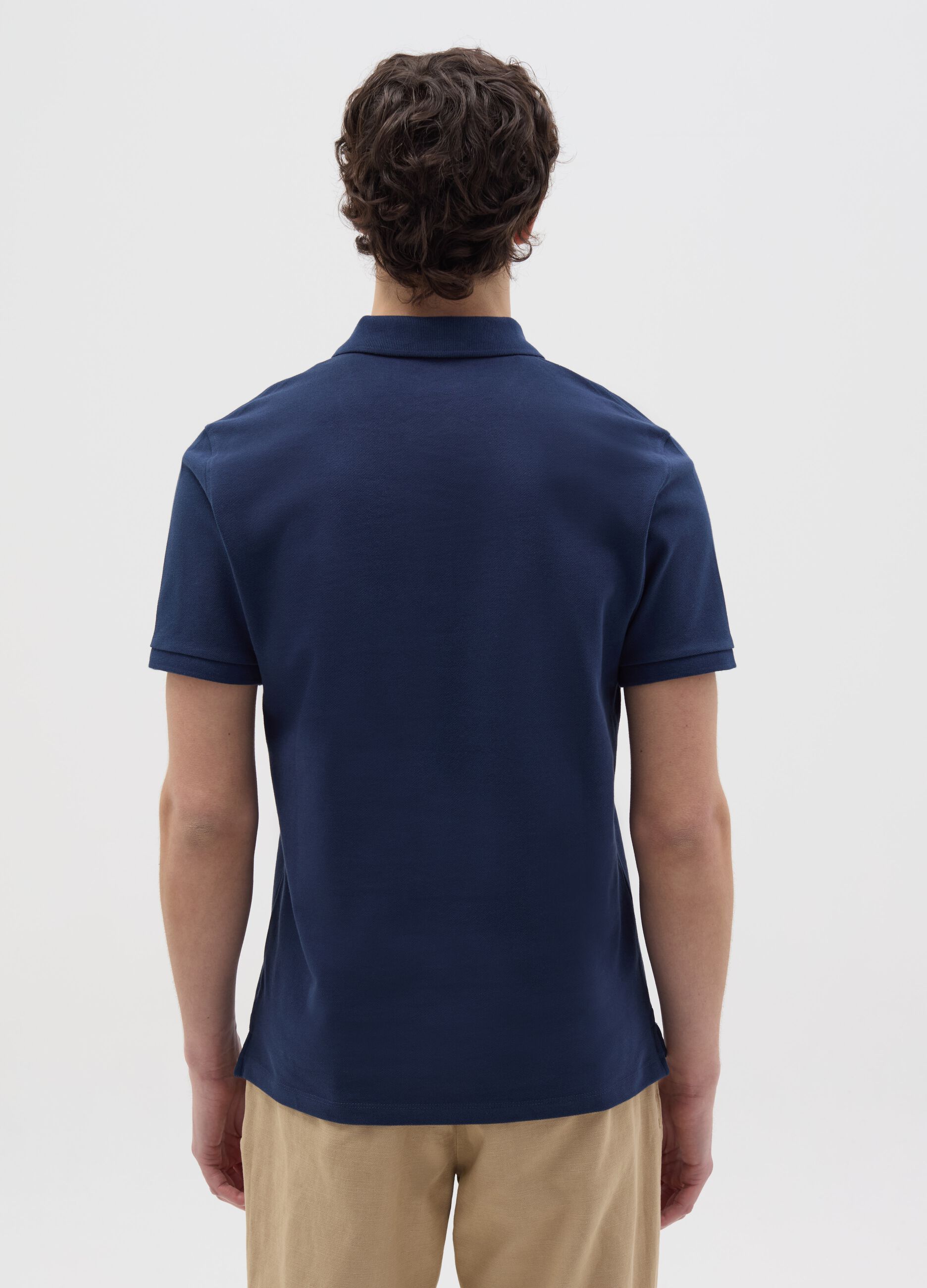 Solid colour polo shirt in organic cotton