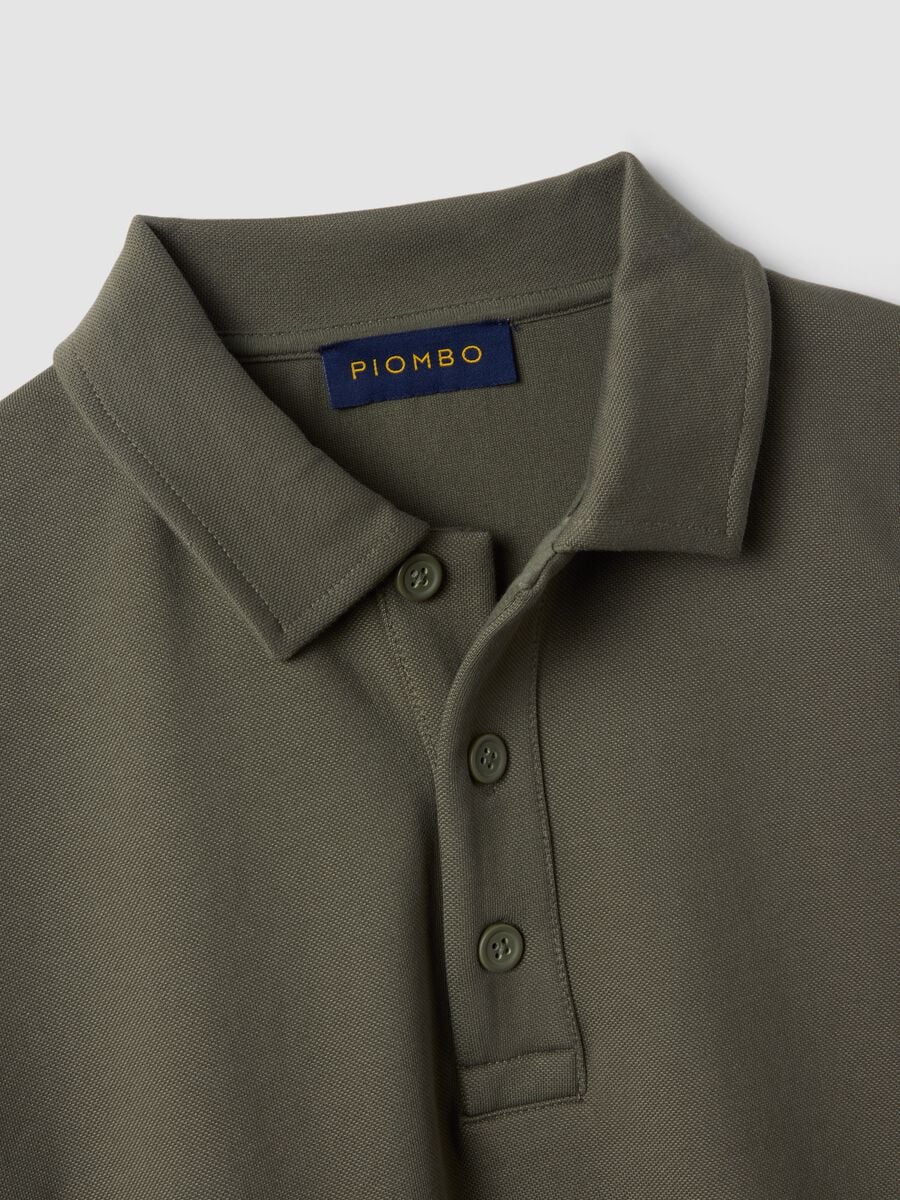 Felpa verde in tessuto elasticizzato con collo polo relaxed fit_1