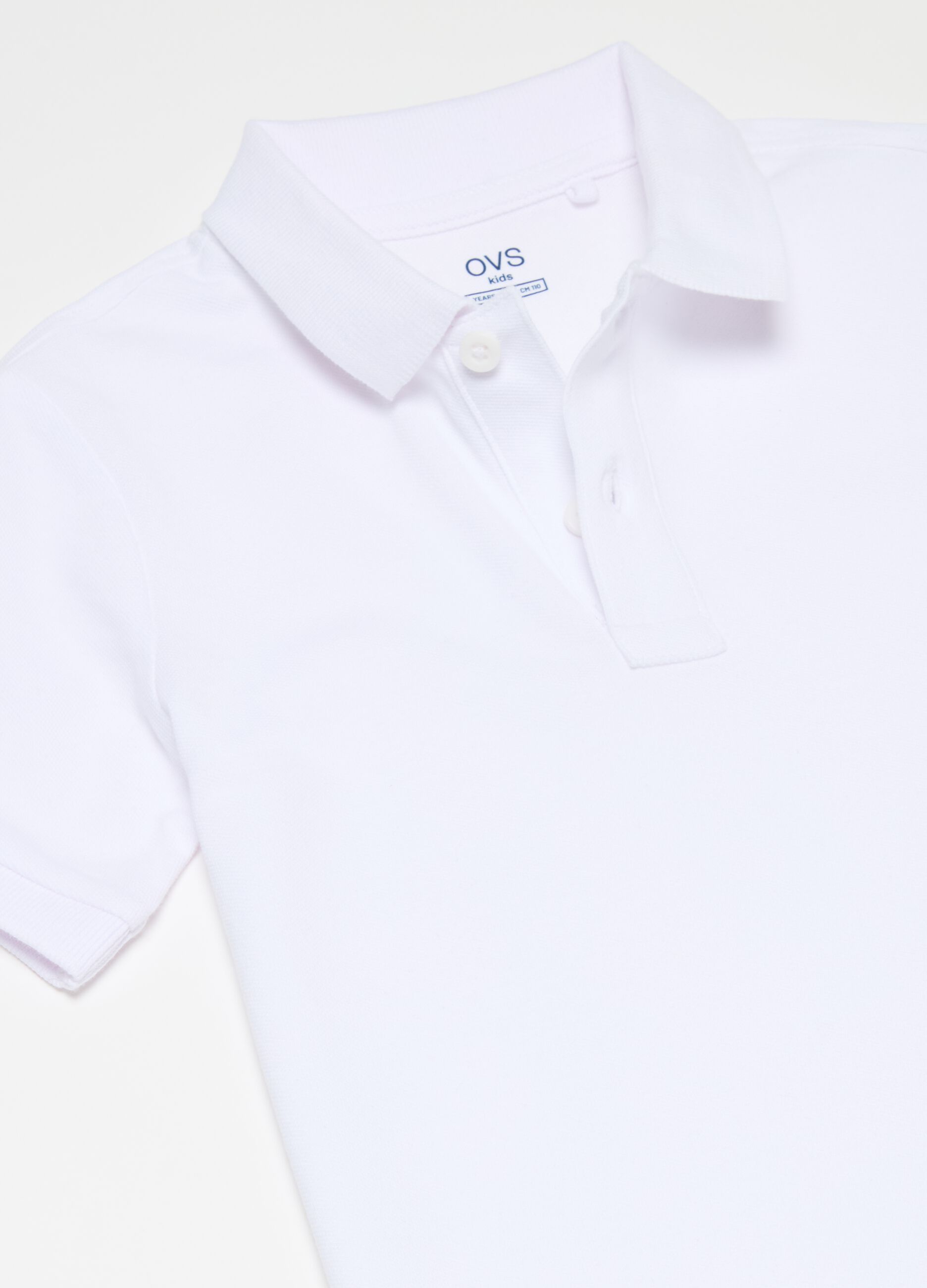 Solid colour cotton piquet polo shirt