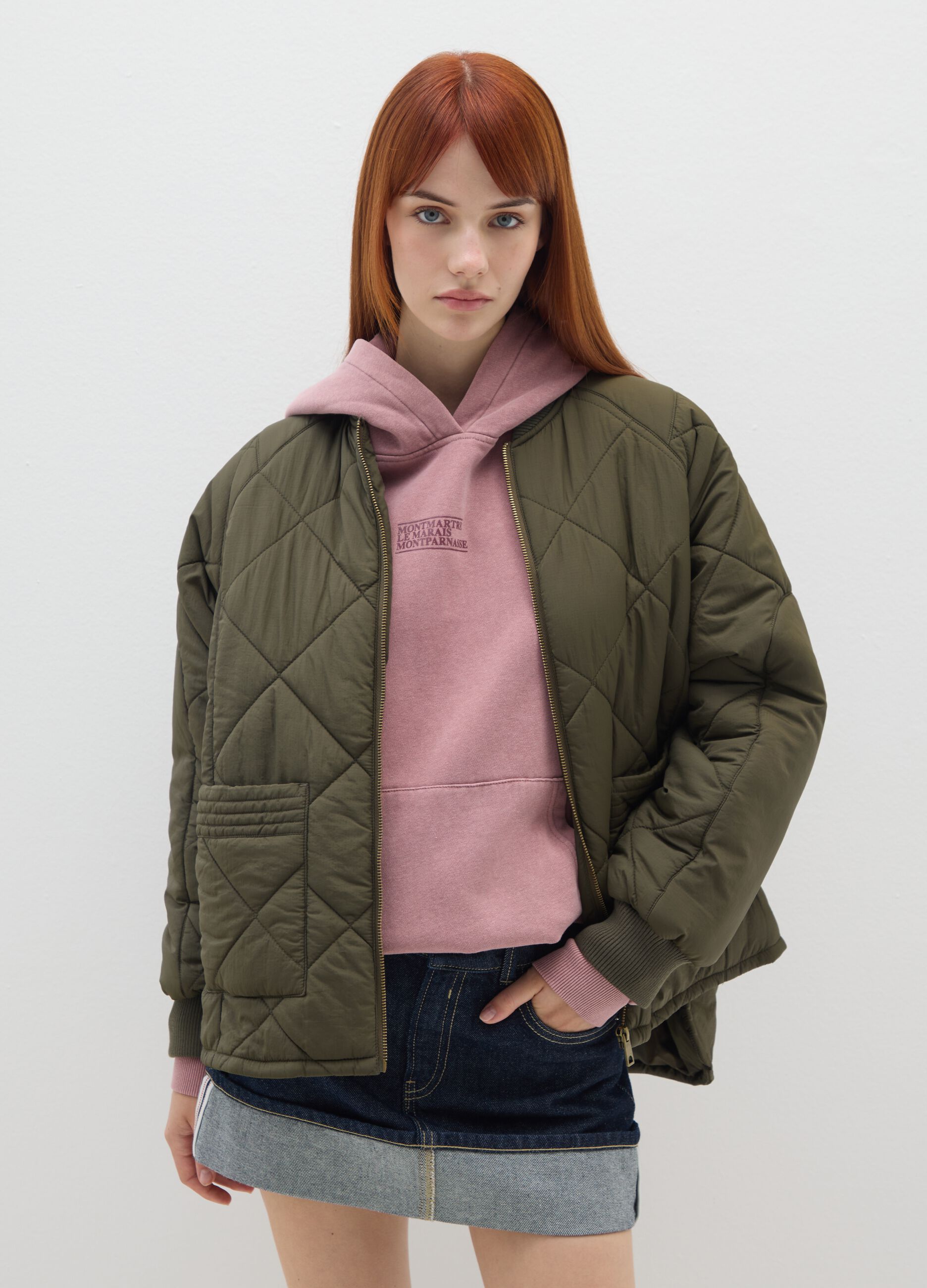 Green padded jacket with oversized fit