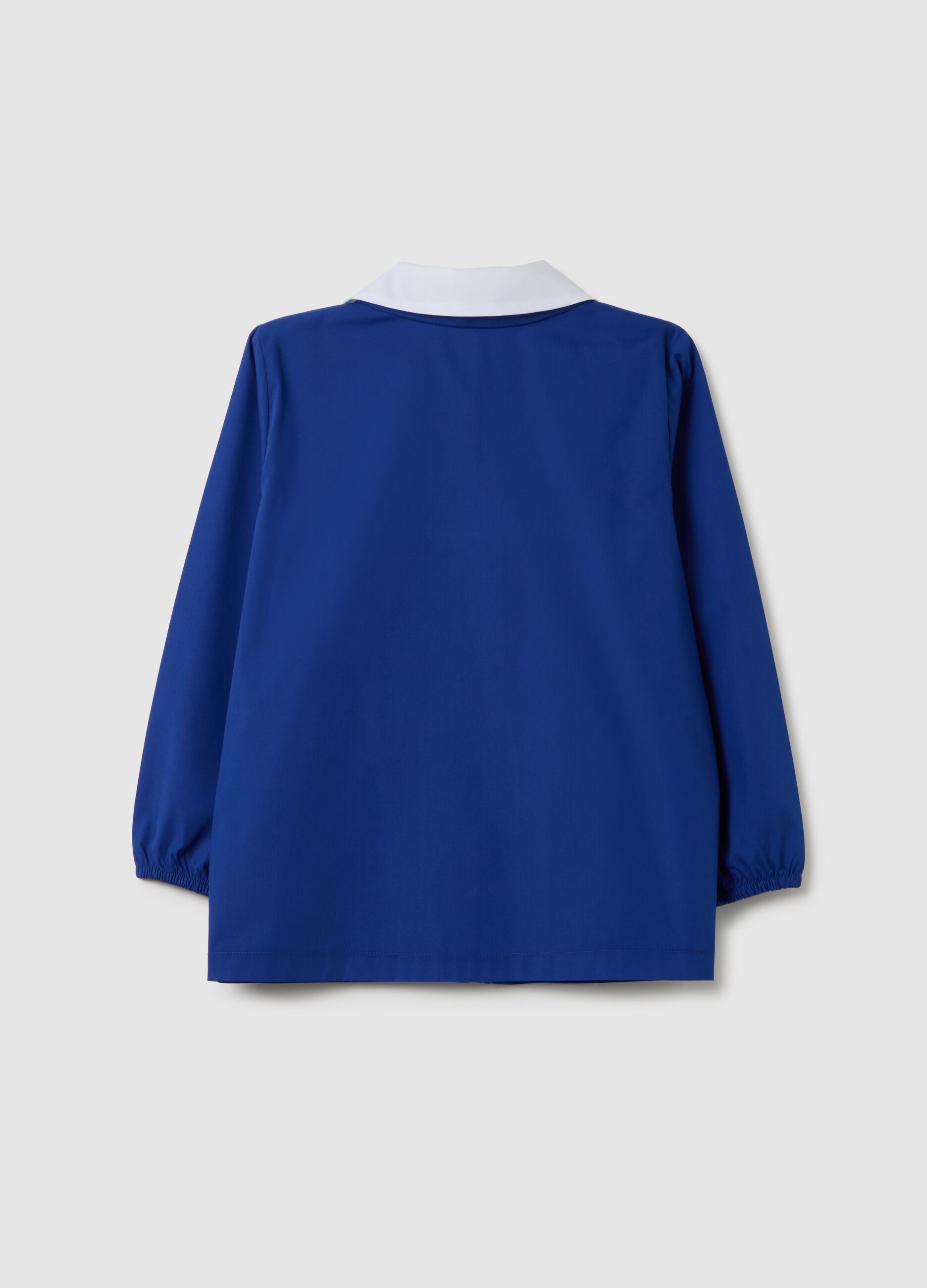Grembiule da bambino in misto cotone blu con ricamo Superman