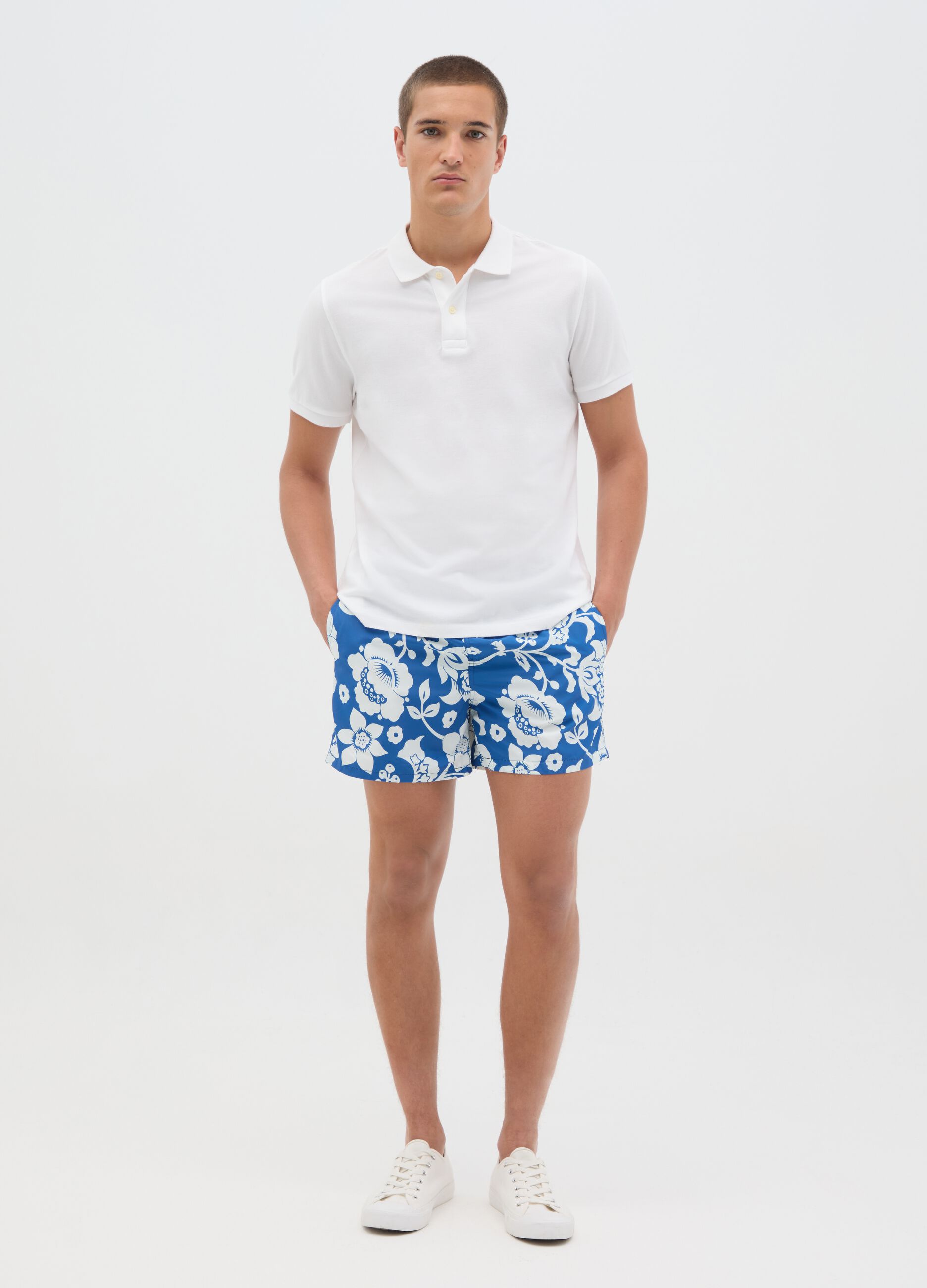 Blue floral print swimming trunks