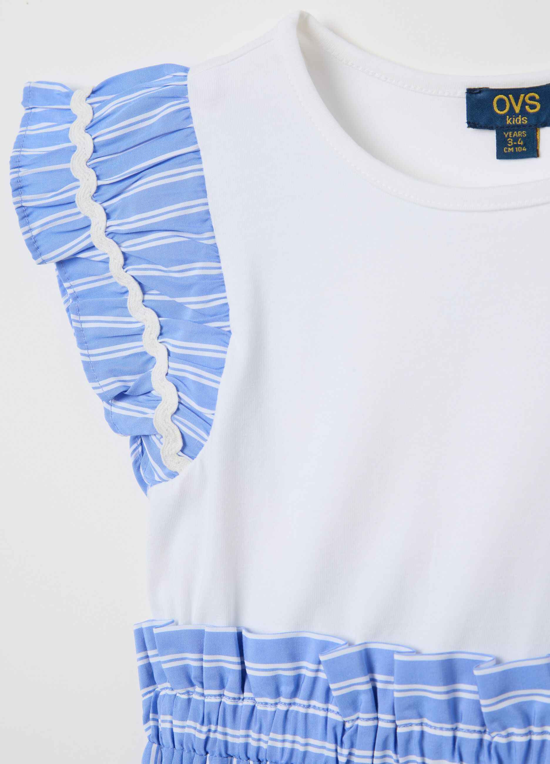 Abito bianco e azzurro a righe con ricamo floreale
