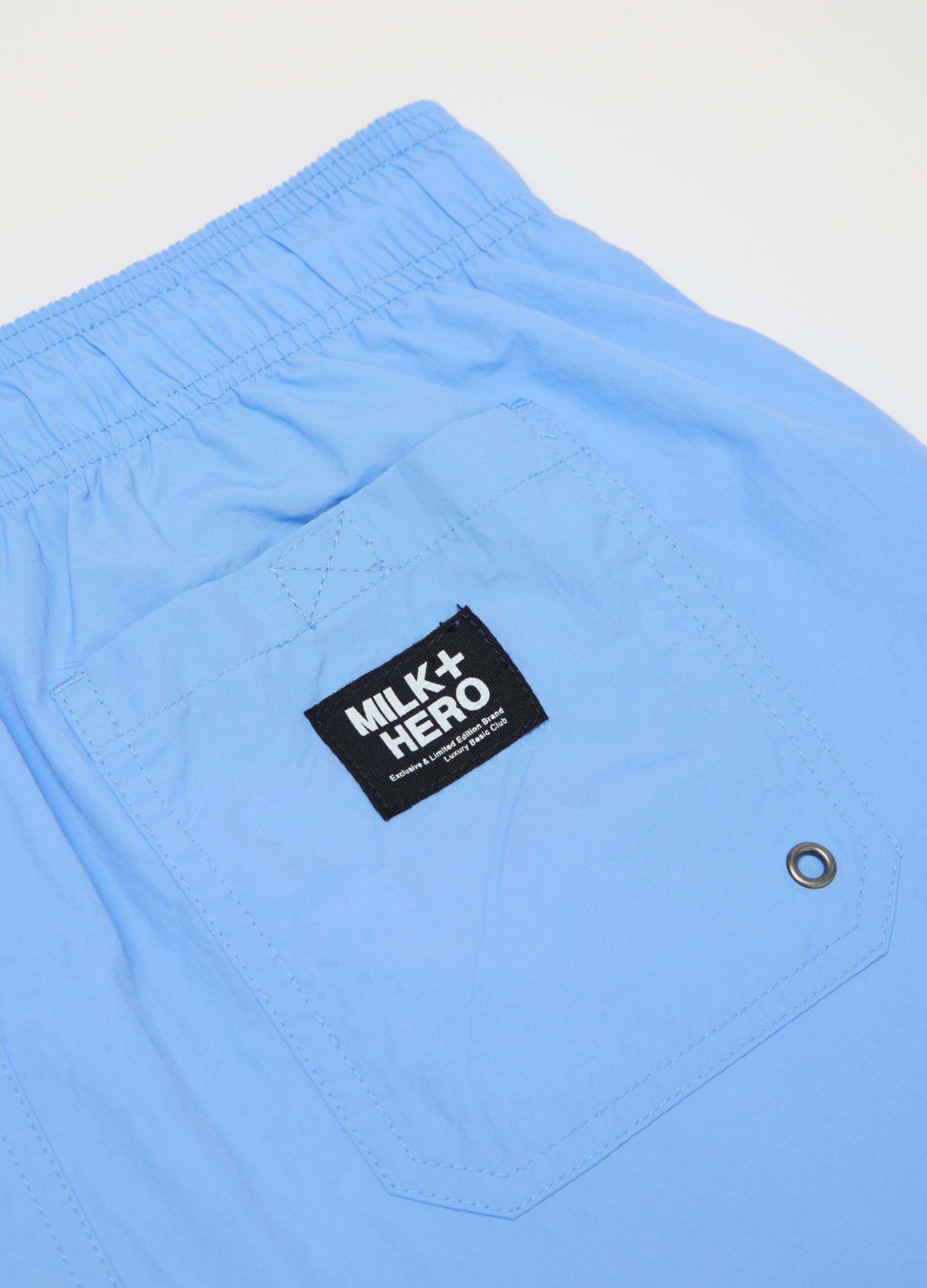 Blue swim shorts in mixed fabric