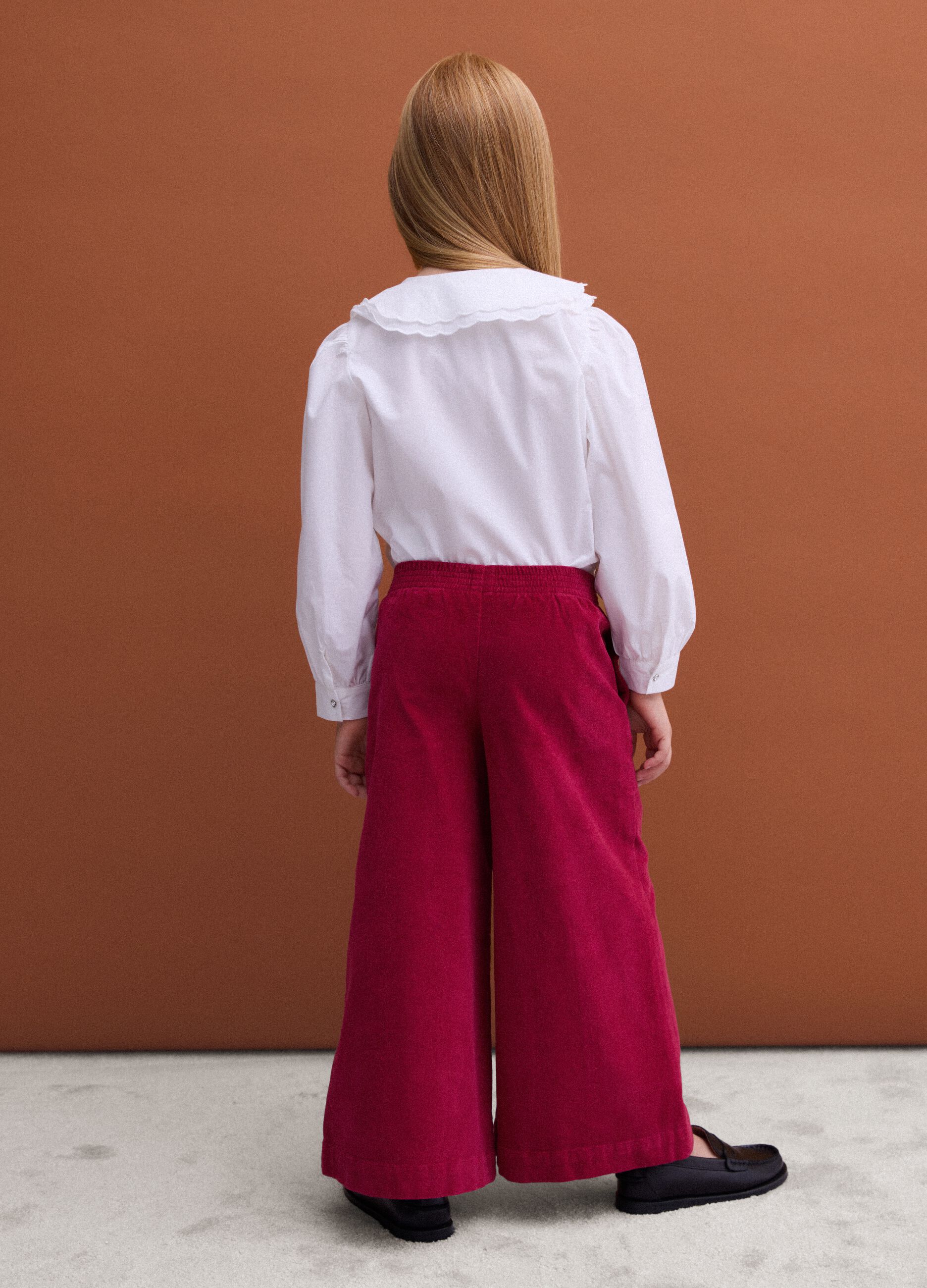 Red velvet wide-leg trousers in stretch cotton with floral embroidery