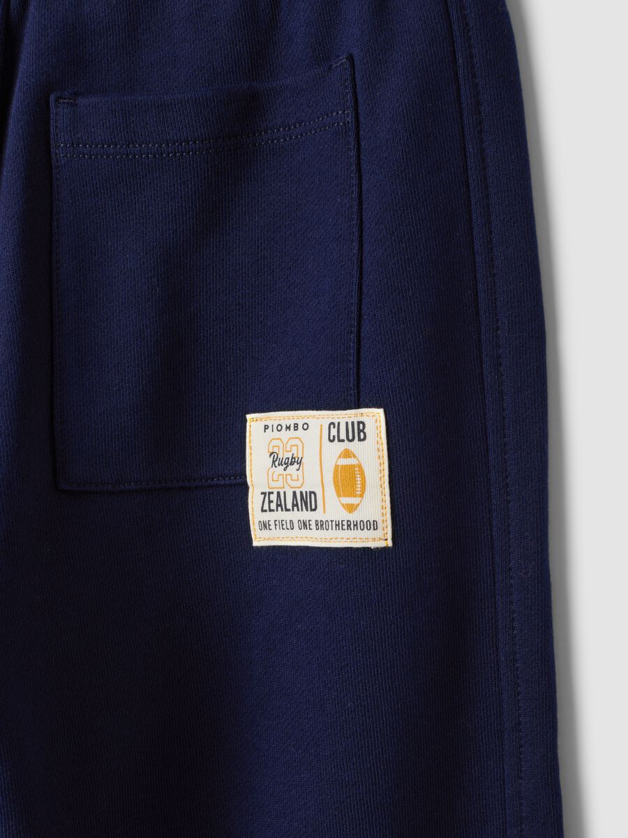 Pantaloni jogger blu in puro cotone con vita elasticizzata per bambino_3