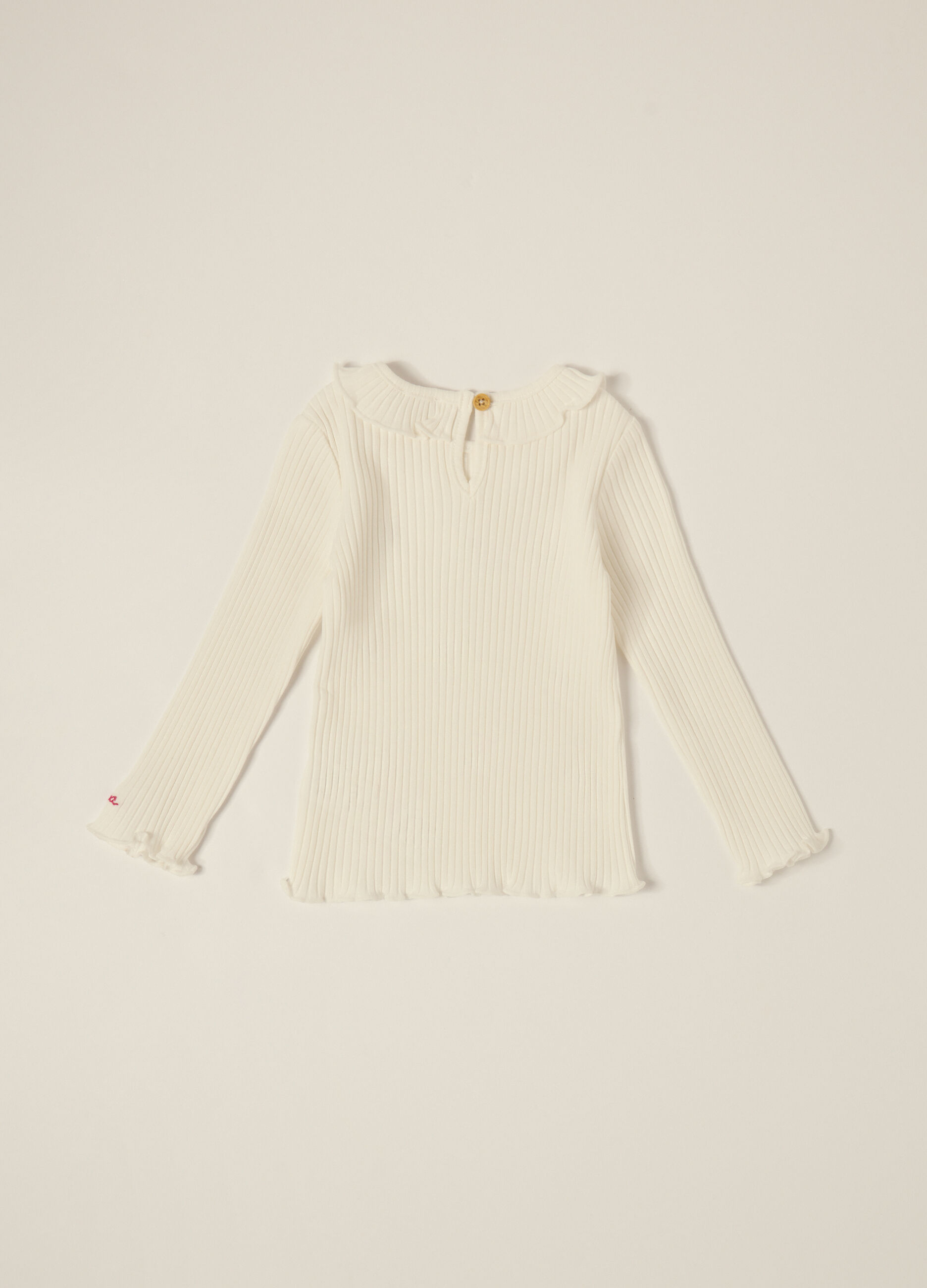 White long sleeve top with embroidery
