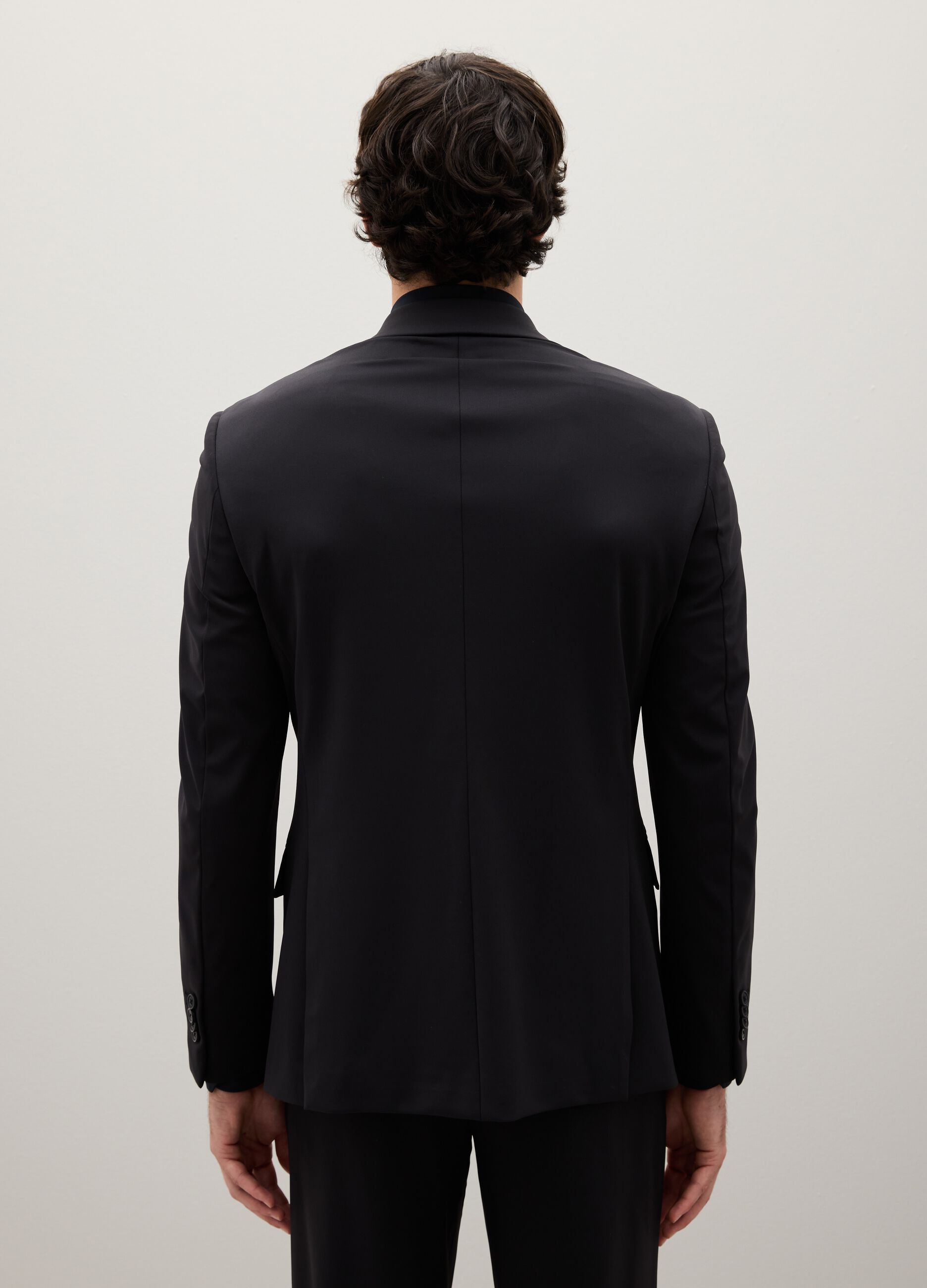 Blazer in tessuto elasticizzato nero slim fit
