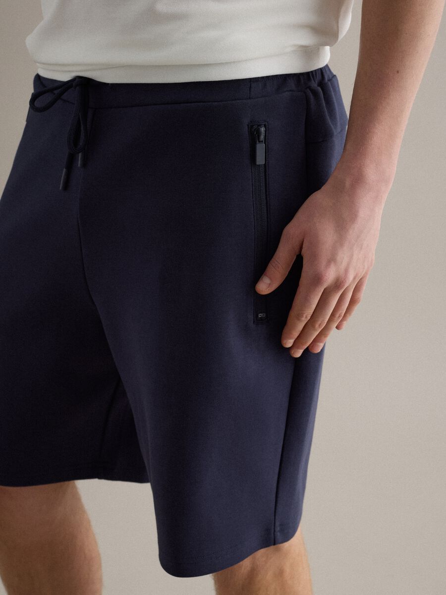 Blue regular fit stretch cotton blend shorts_3