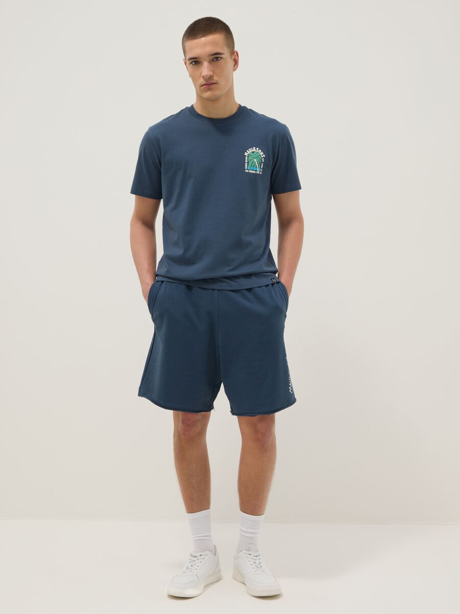 T-shirt blu a maniche corte in puro cotone_1