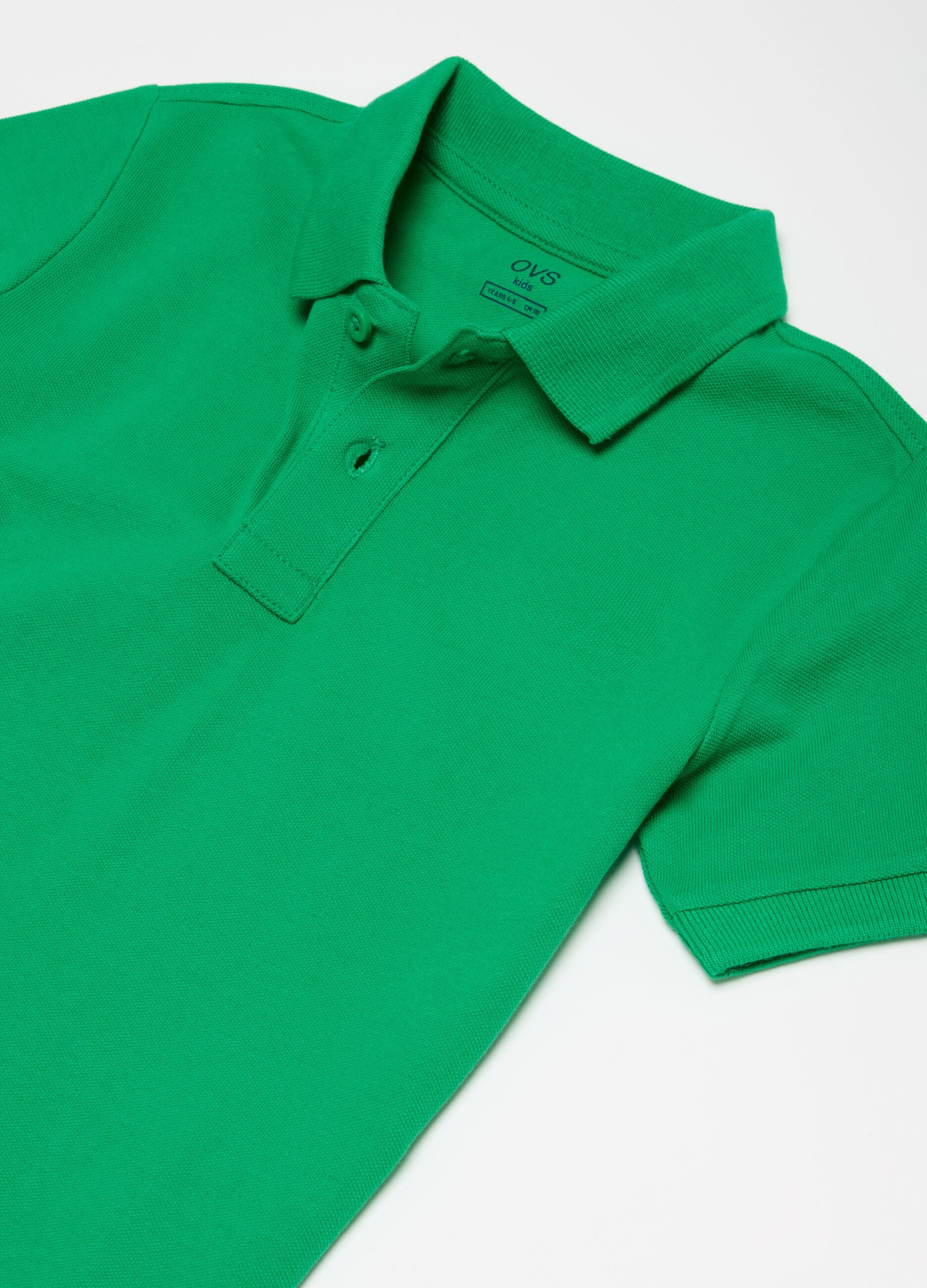 Solid colour cotton piquet polo shirt