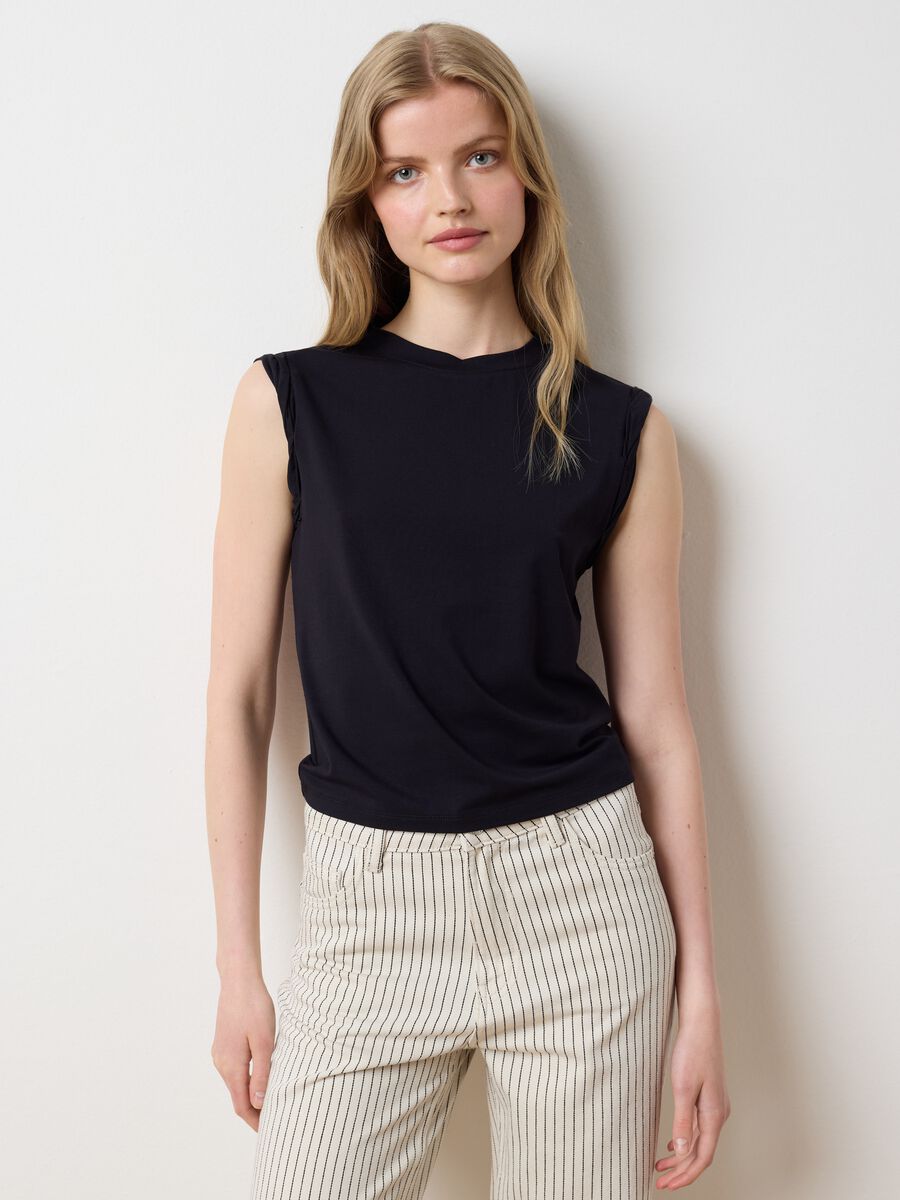 Black vest with rolled detail_1