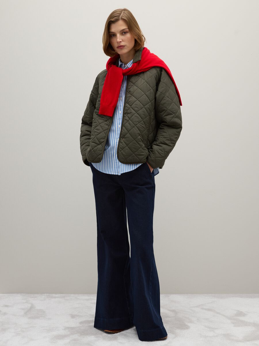 Jeans in denim blu a gamba larga elasticizzati_0