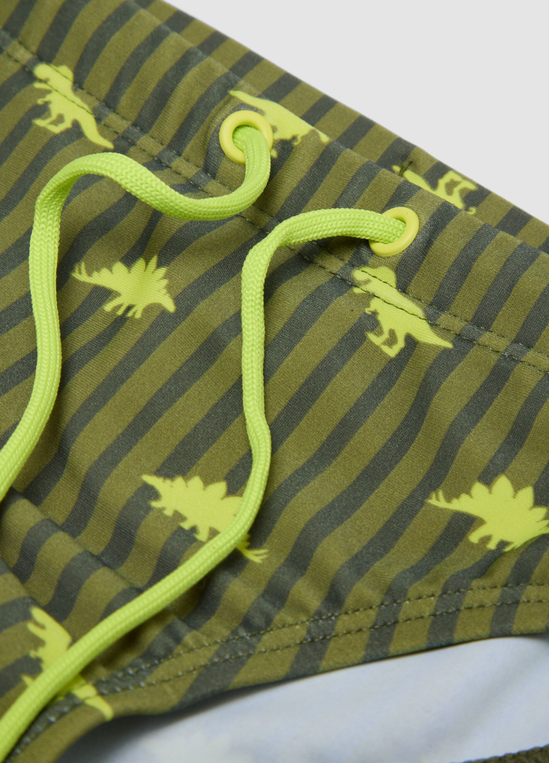 Green dinosaur-print stretch swim briefs