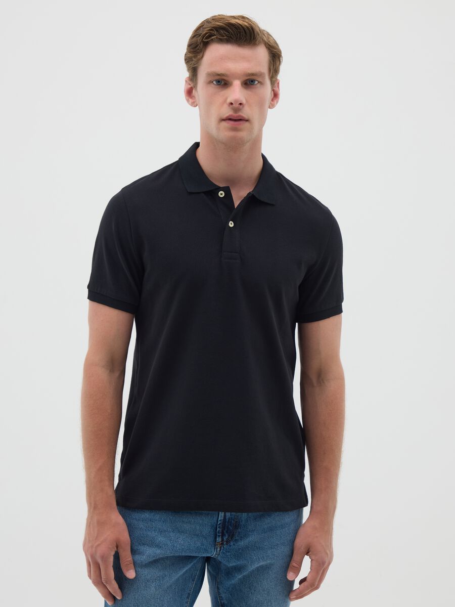 Polo da uomo in puro cotone nero regular fit_0