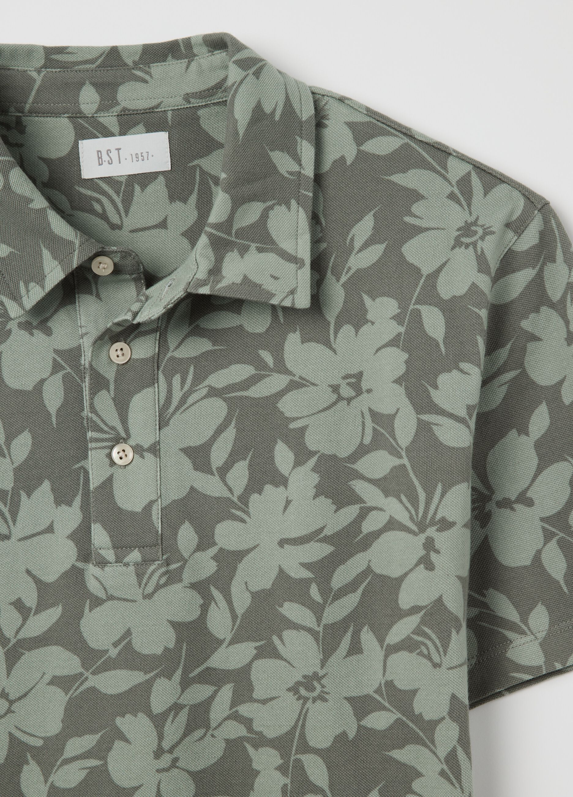 Polo a maniche corte verde con stampa floreale BST