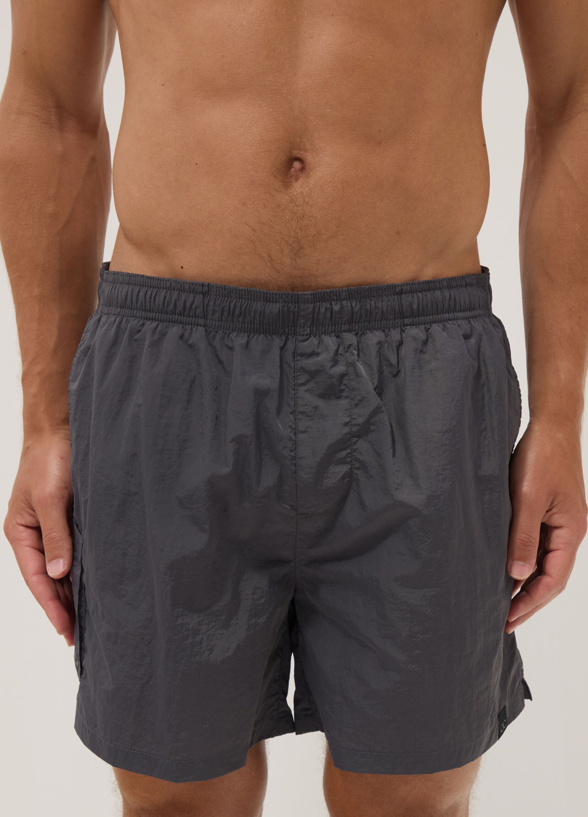 Grey swim shorts with elasticated waist