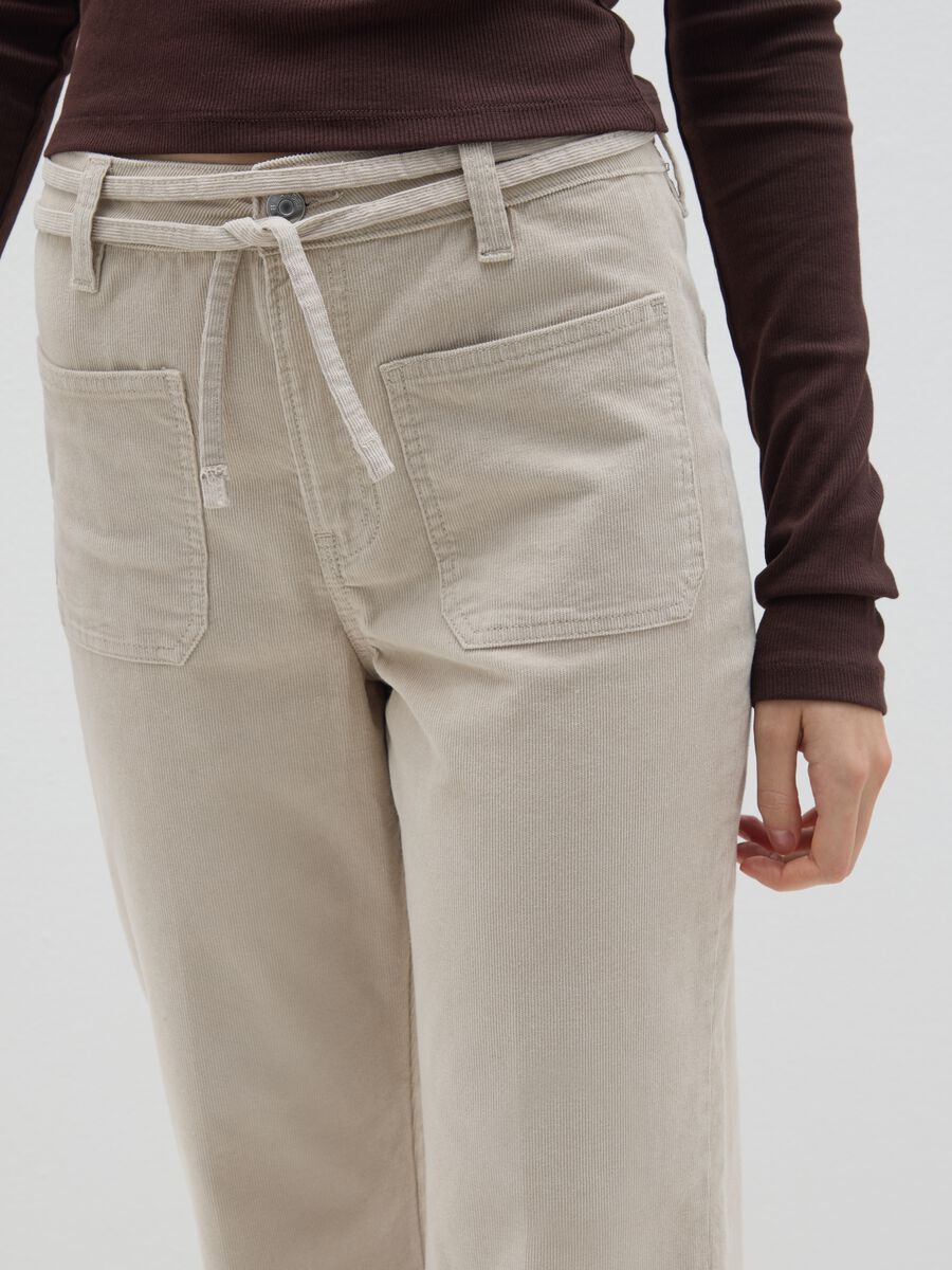 Beige flared corduroy trousers_3