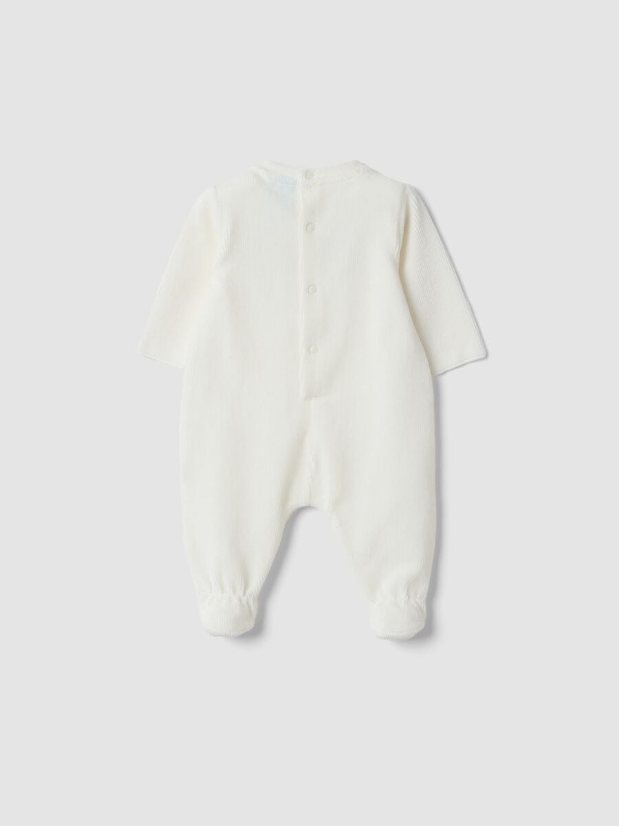 Tutina bianca in cotone organico elasticizzato con piedini e stampa Minnie_1