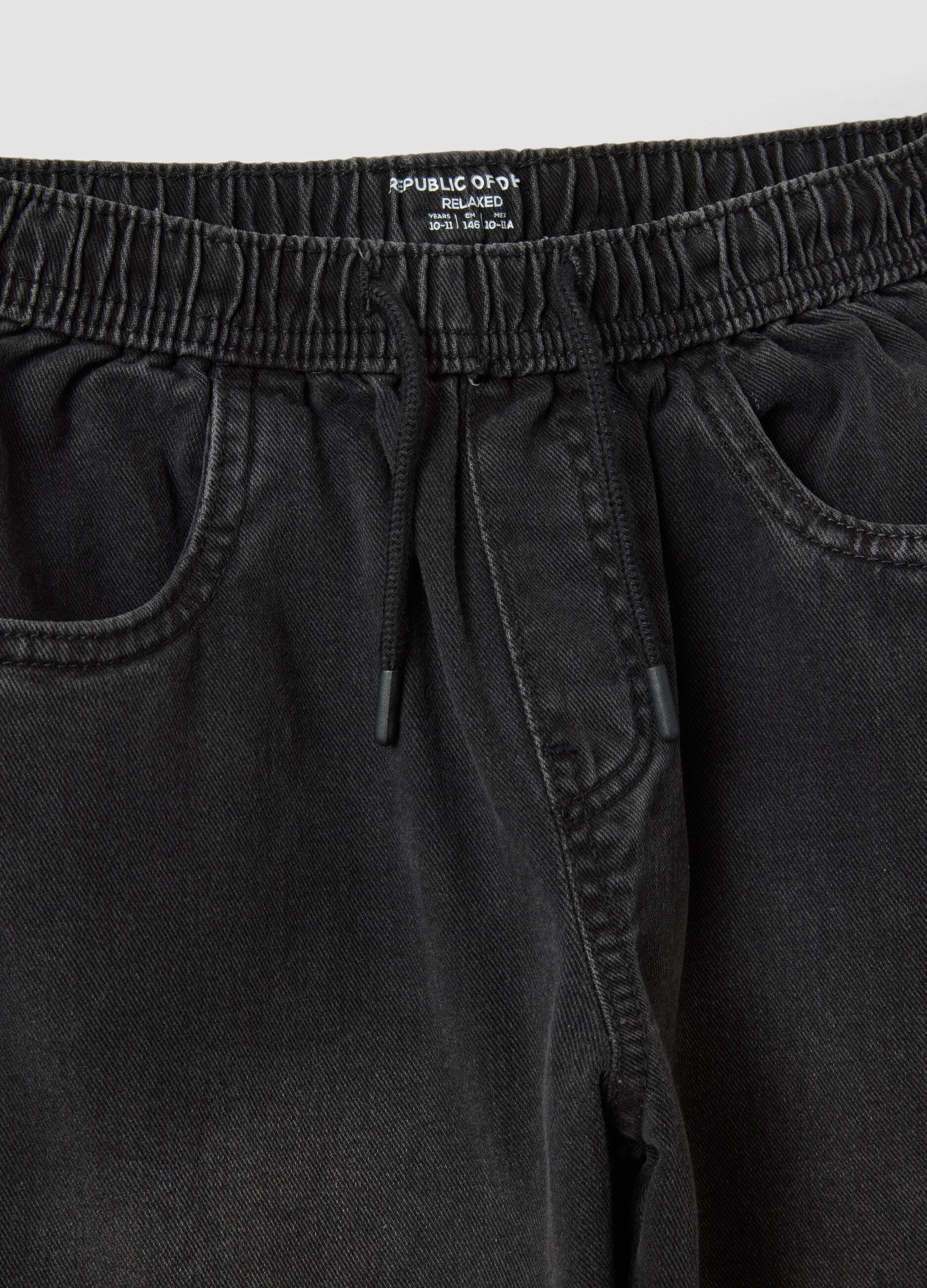 Black pure cotton denim joggers with cargo pockets, relaxed fit