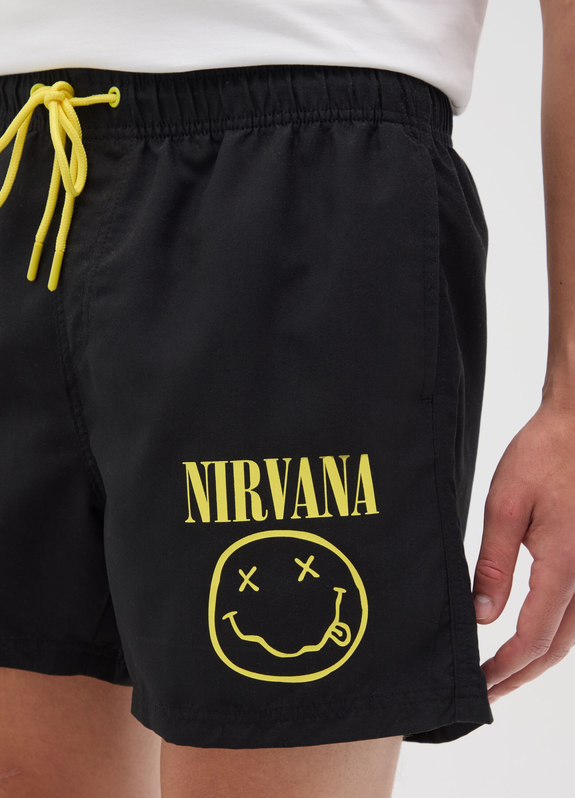 Black swimming trunks with Nirvana logo