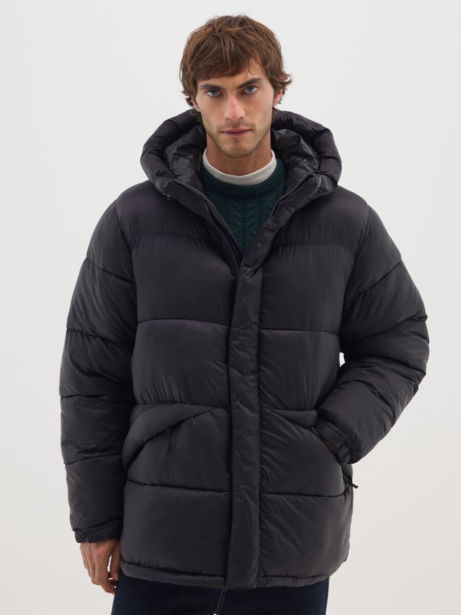 Piumino The Iconic Puffer nero con cappuccio regolabile_0