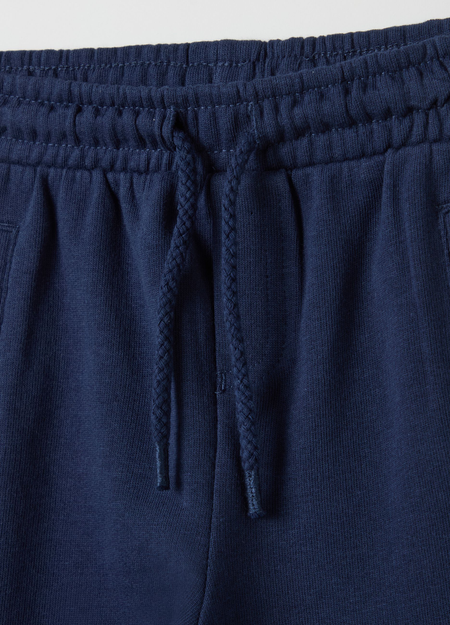 Joggers con coulisse e piping a contrasto 