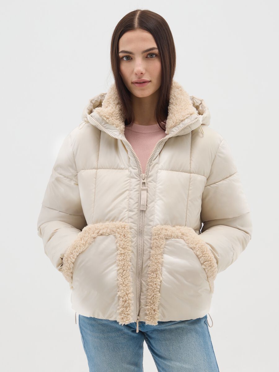 The Iconic Puffer light beige jacket with hood and sherpa details_1