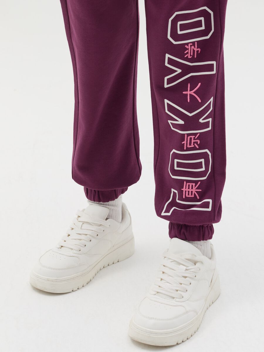 Joggers with "Tokyo" embroidery and print_1