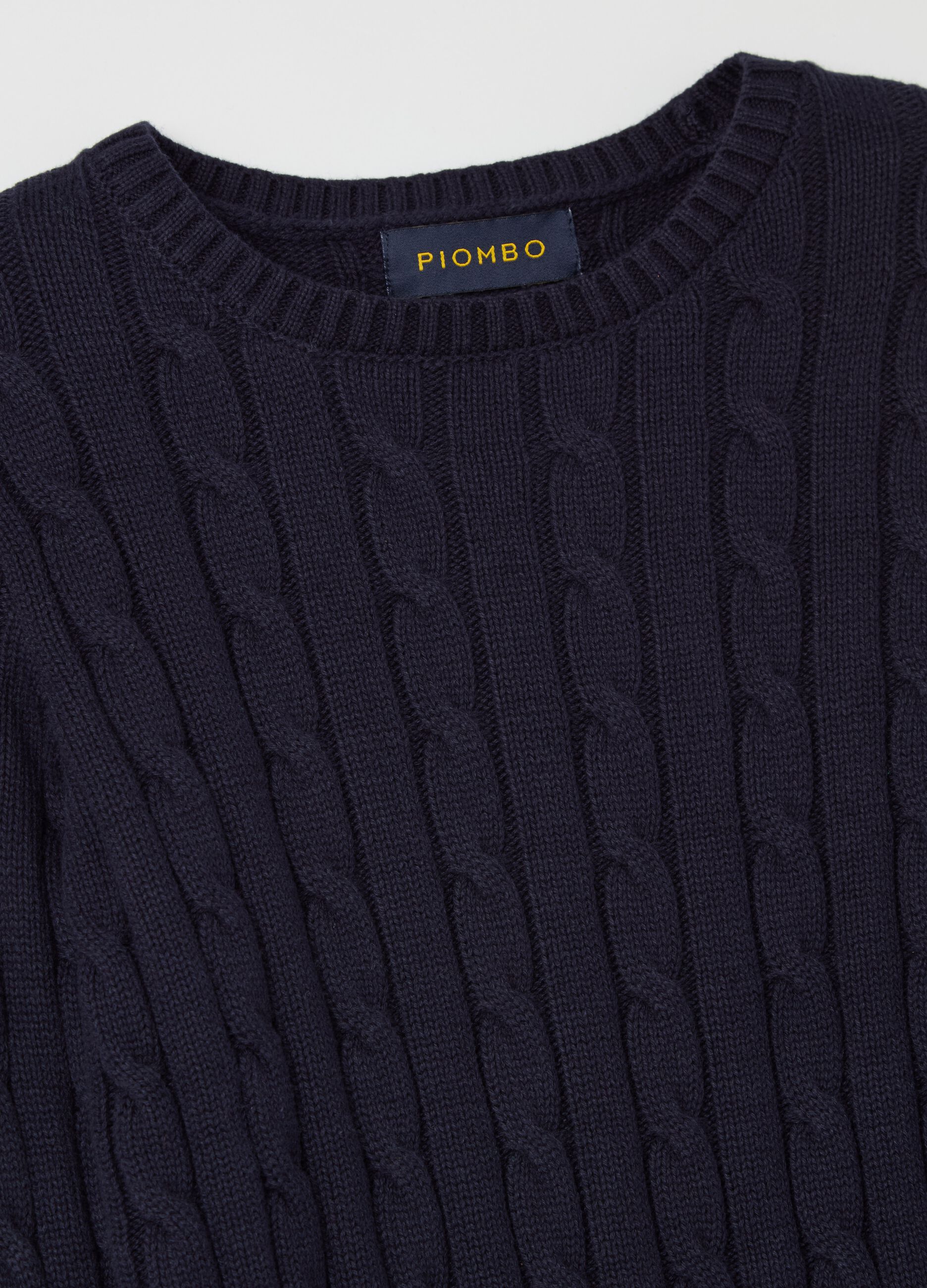 Ribbed pullover with cable-knit design