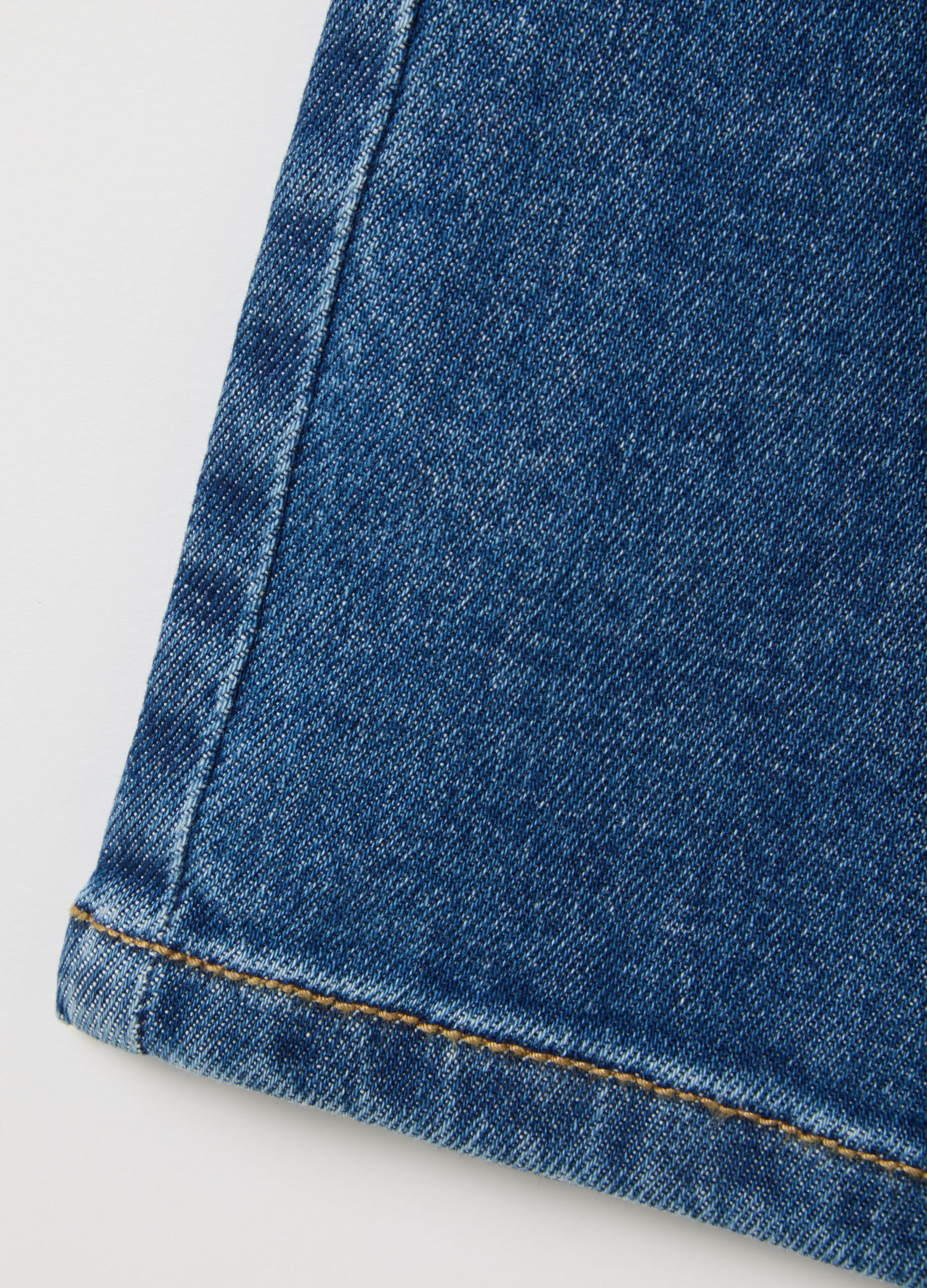 Wide elasticated blue denim trousers for girls