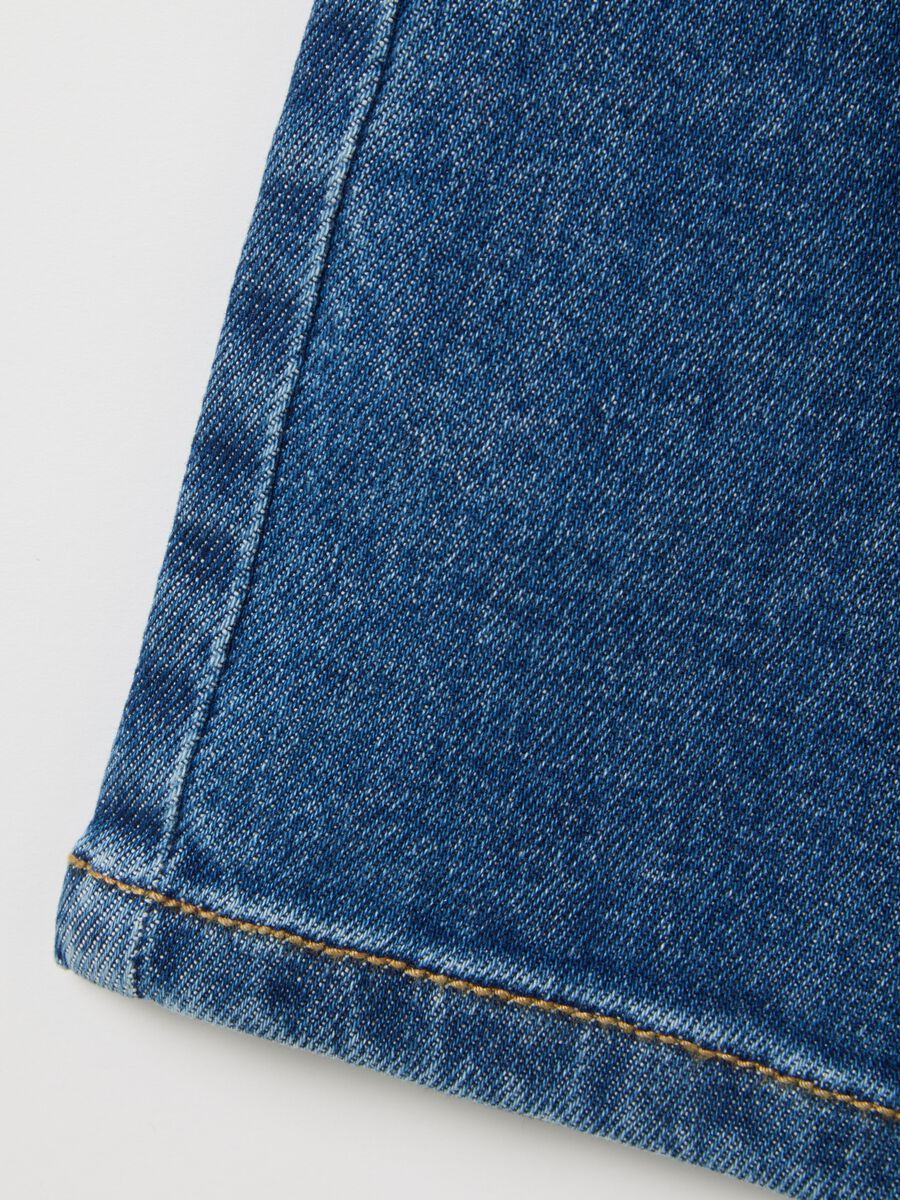 Wide elasticated blue denim trousers for girls_3