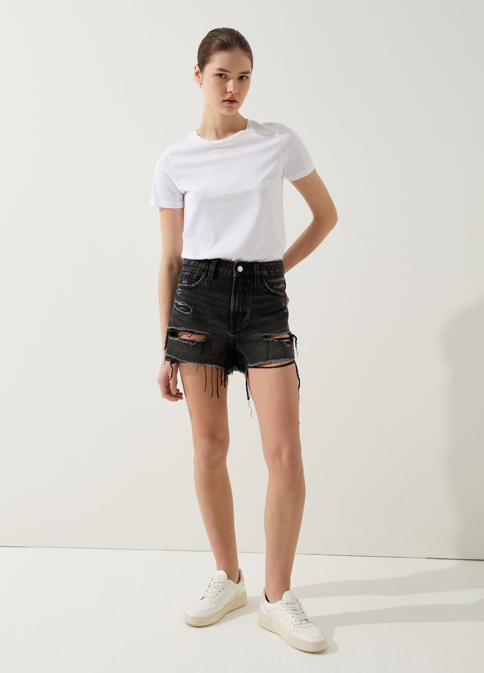 Denim shorts with rips and high waist