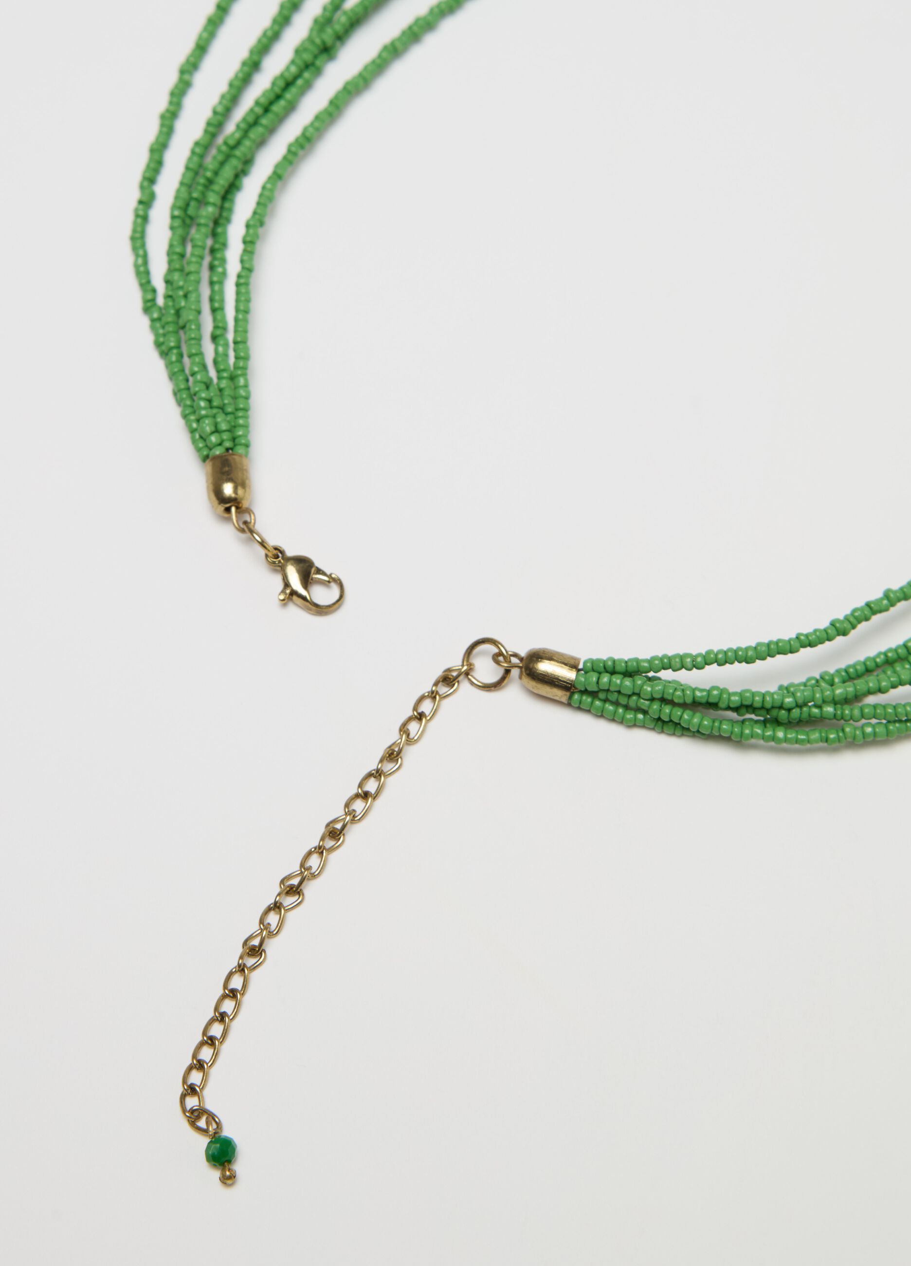 Multi-strand necklace with tassel and beads