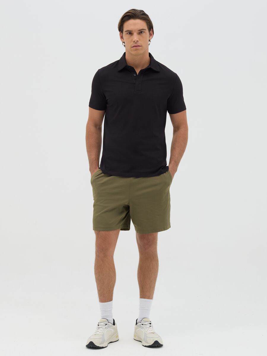 Green Bermuda joggers in stretch fabric_0
