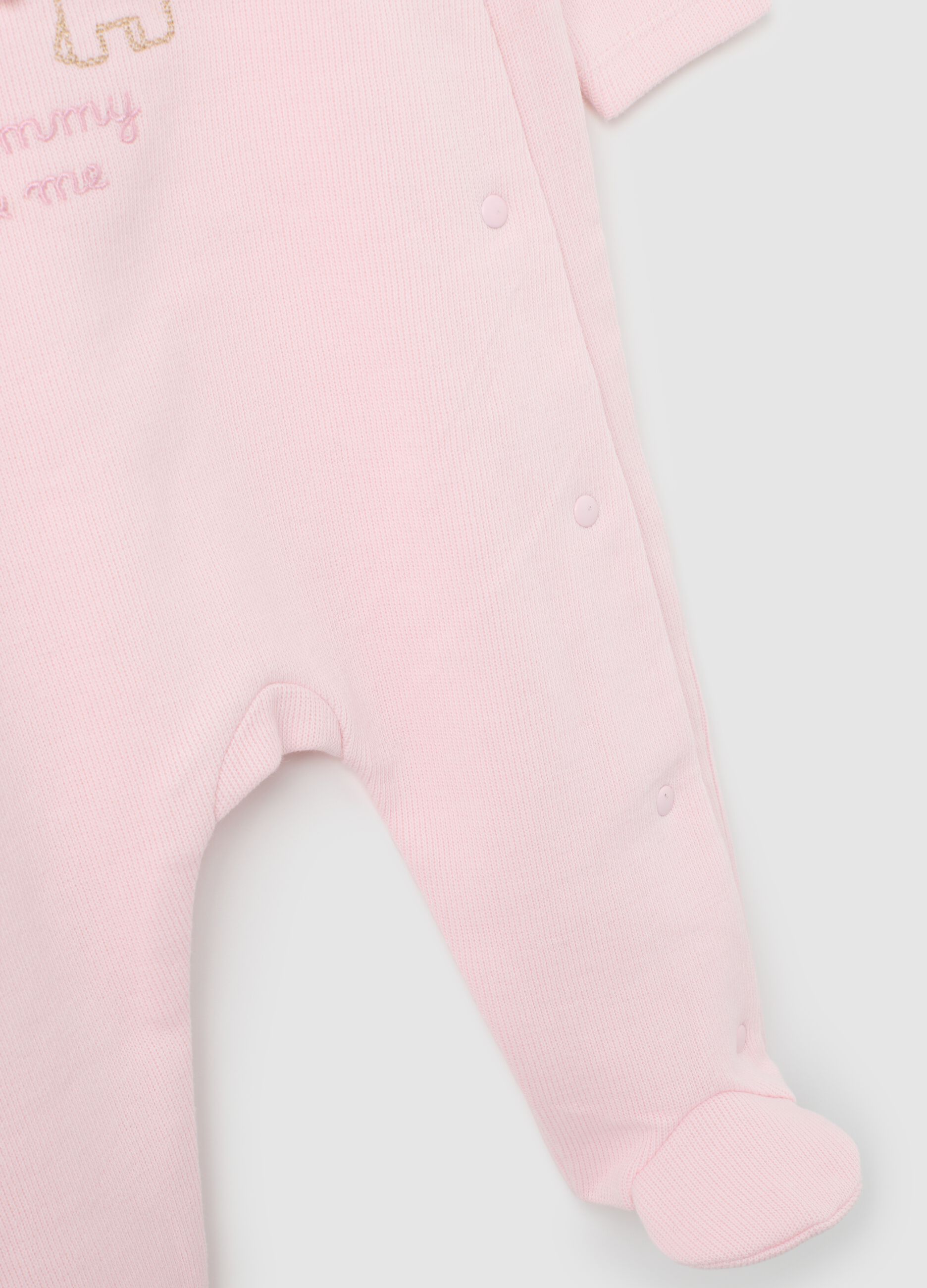 Baby sleepsuit in pure pink cotton with lions