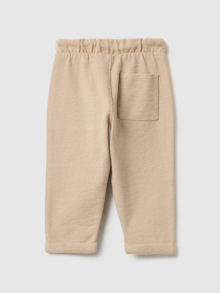 Beige regular fit pure cotton trousers_1