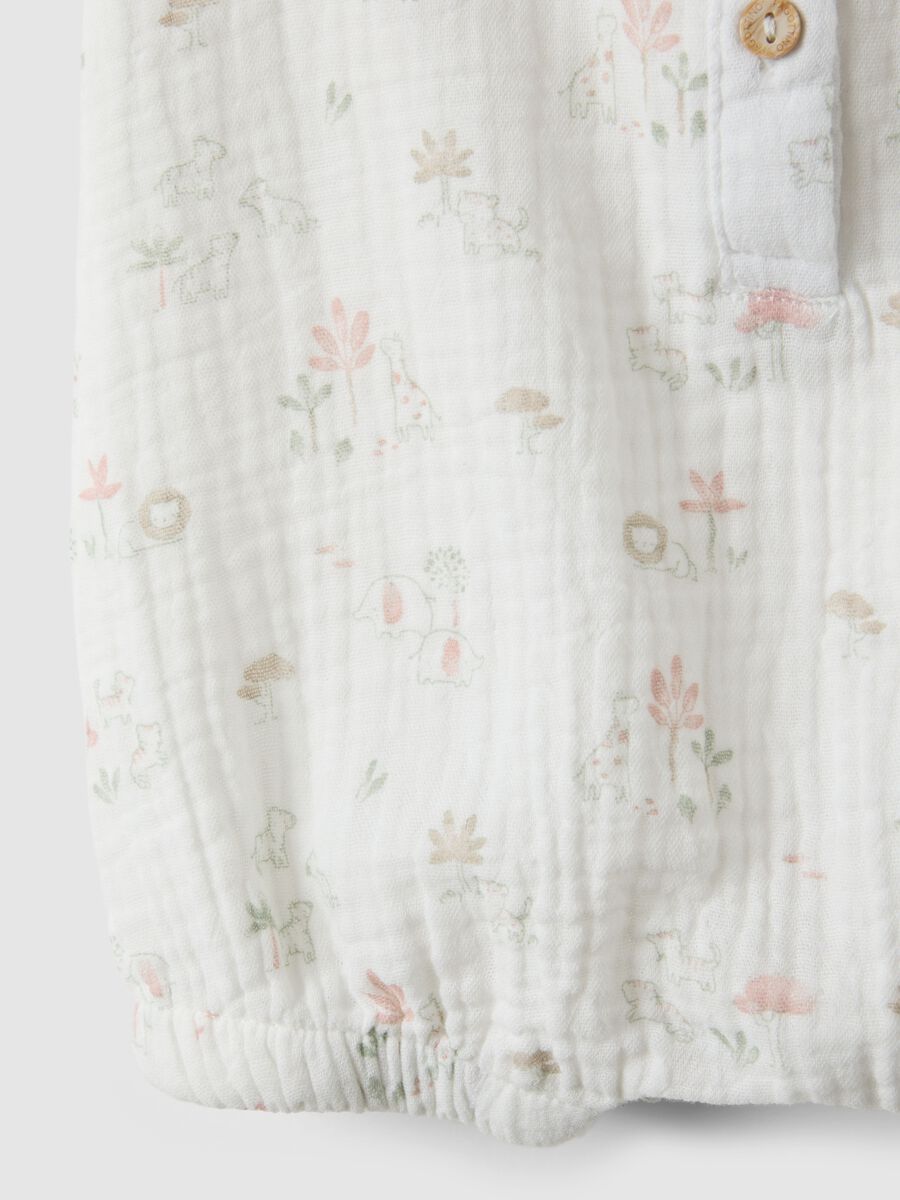 Pagliaccetto in puro cotone bianco da neonata con volant_3