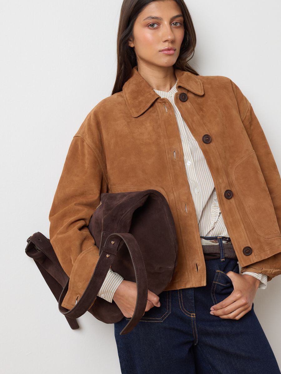 Genuine leather jacket with buttons and large pockets_0