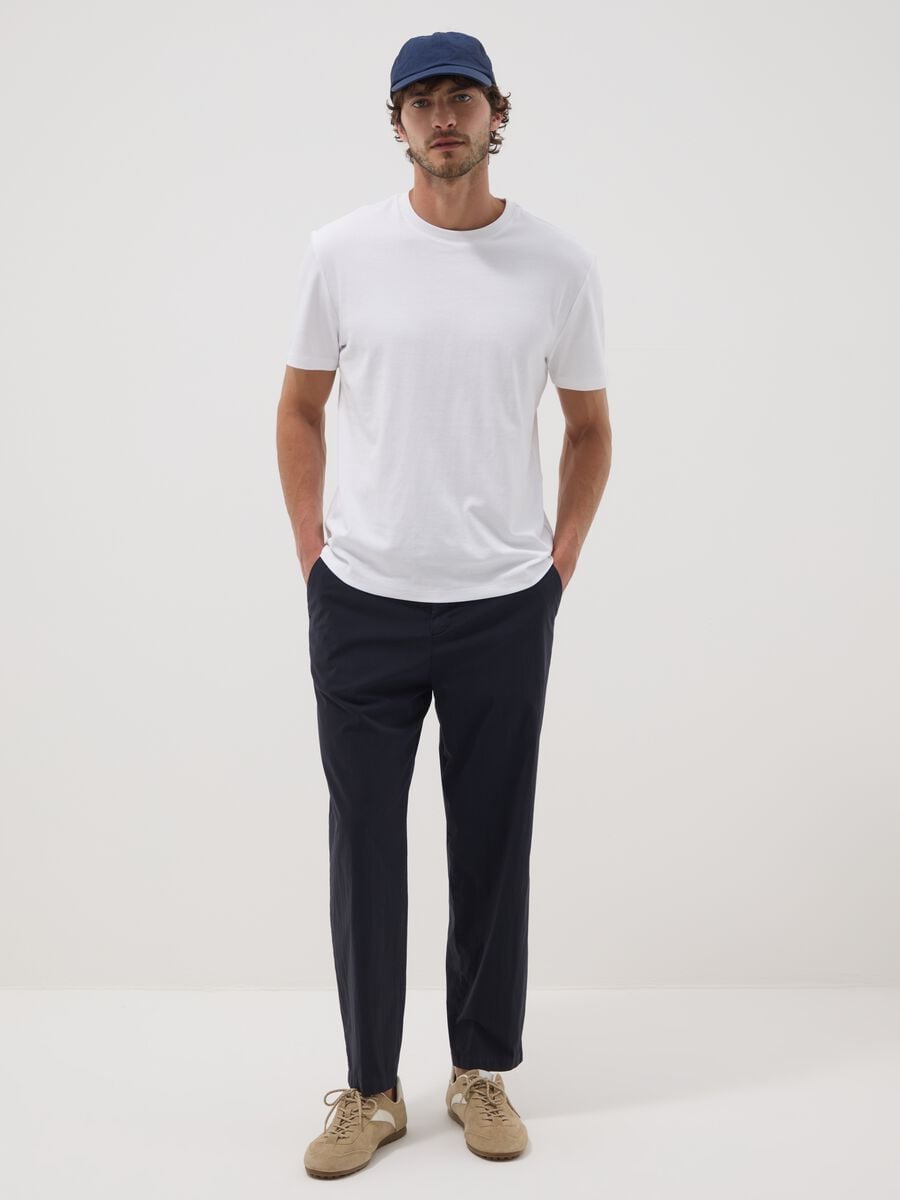 Pantaloni chino blu in cotone elasticizzato carrot fit_0