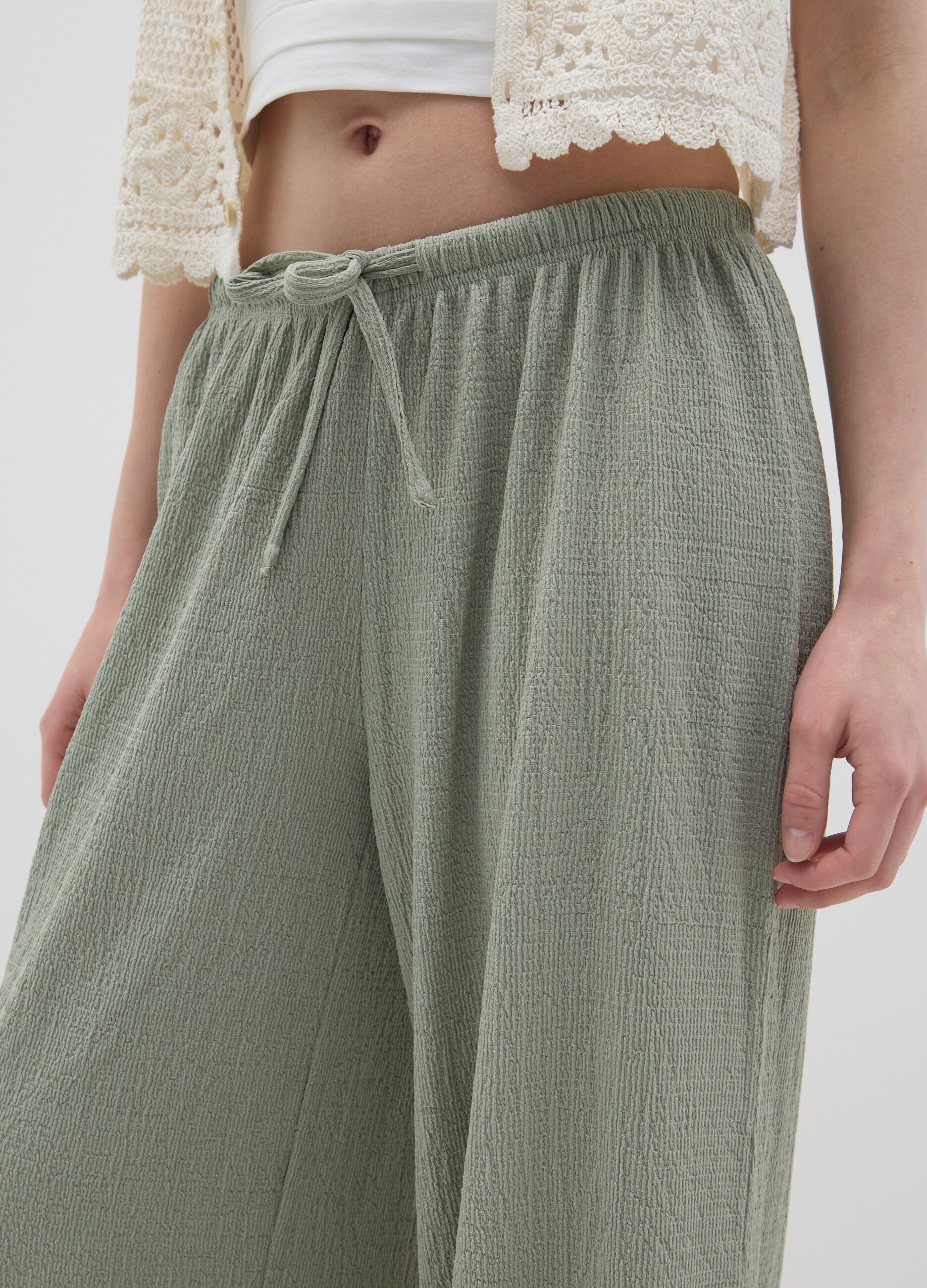 Women’s palazzo pants in green stretch fabric