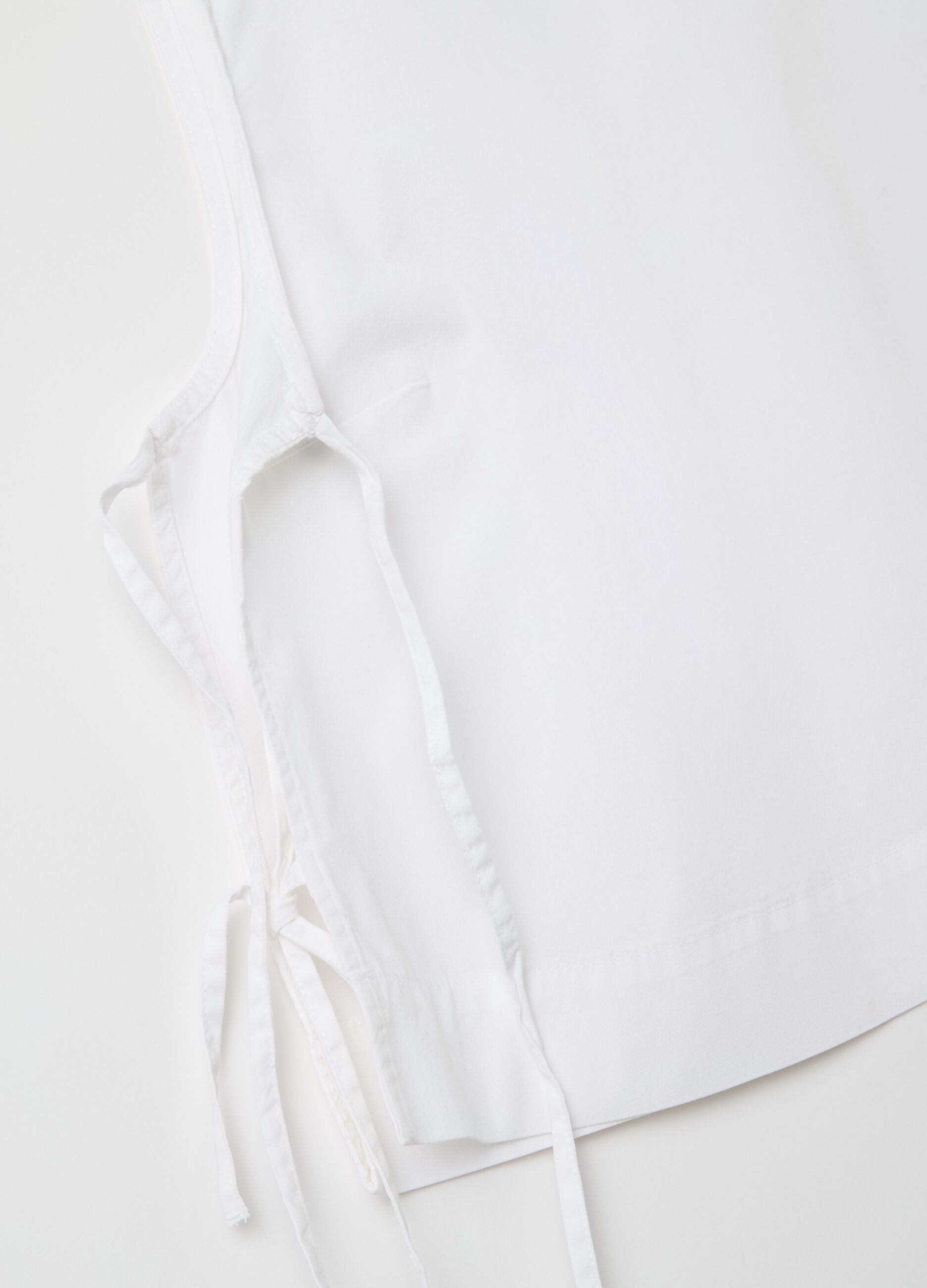 Blouse with splits and laces