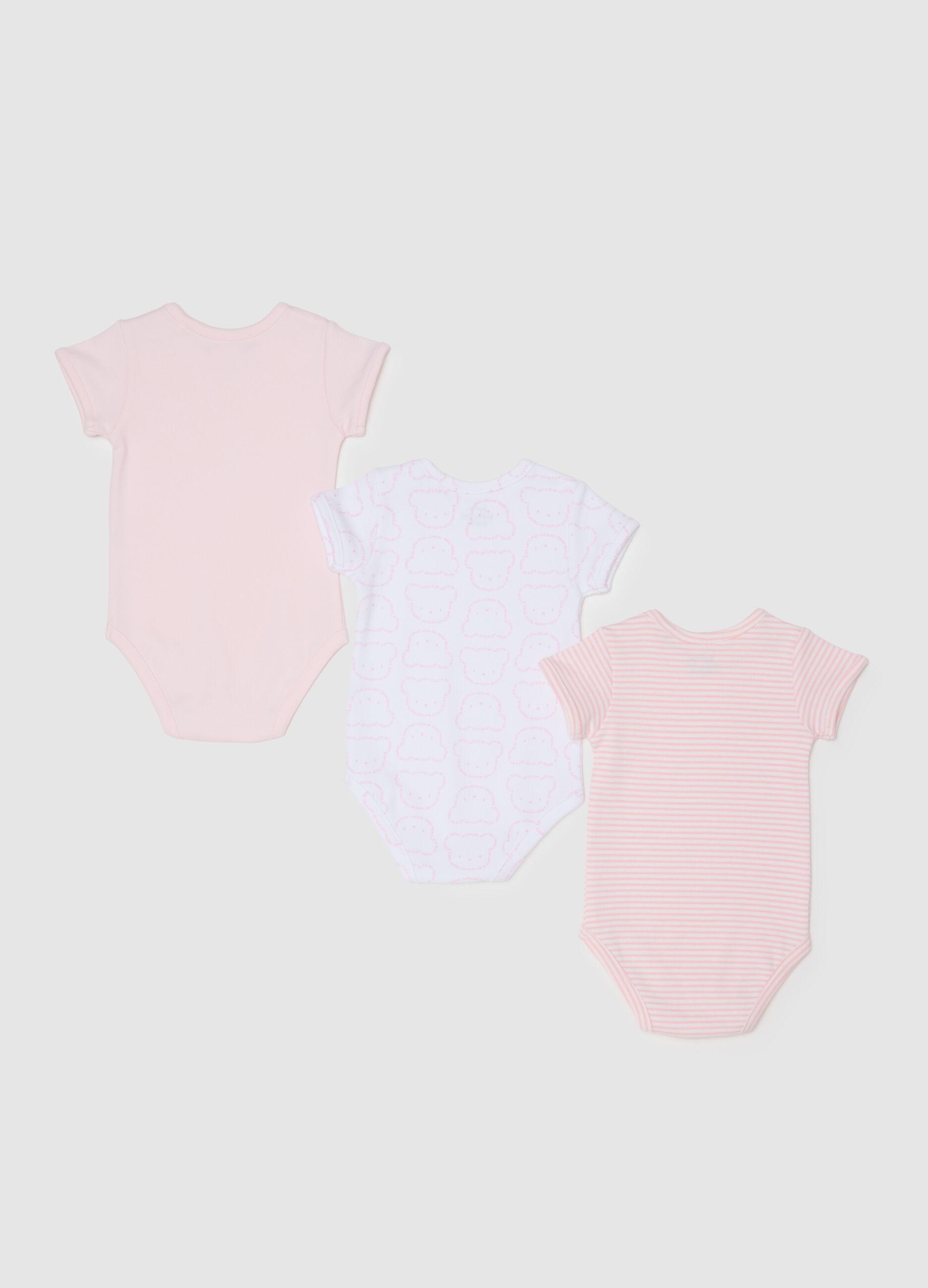 Set of three baby girl cotton bodysuits in multicolour