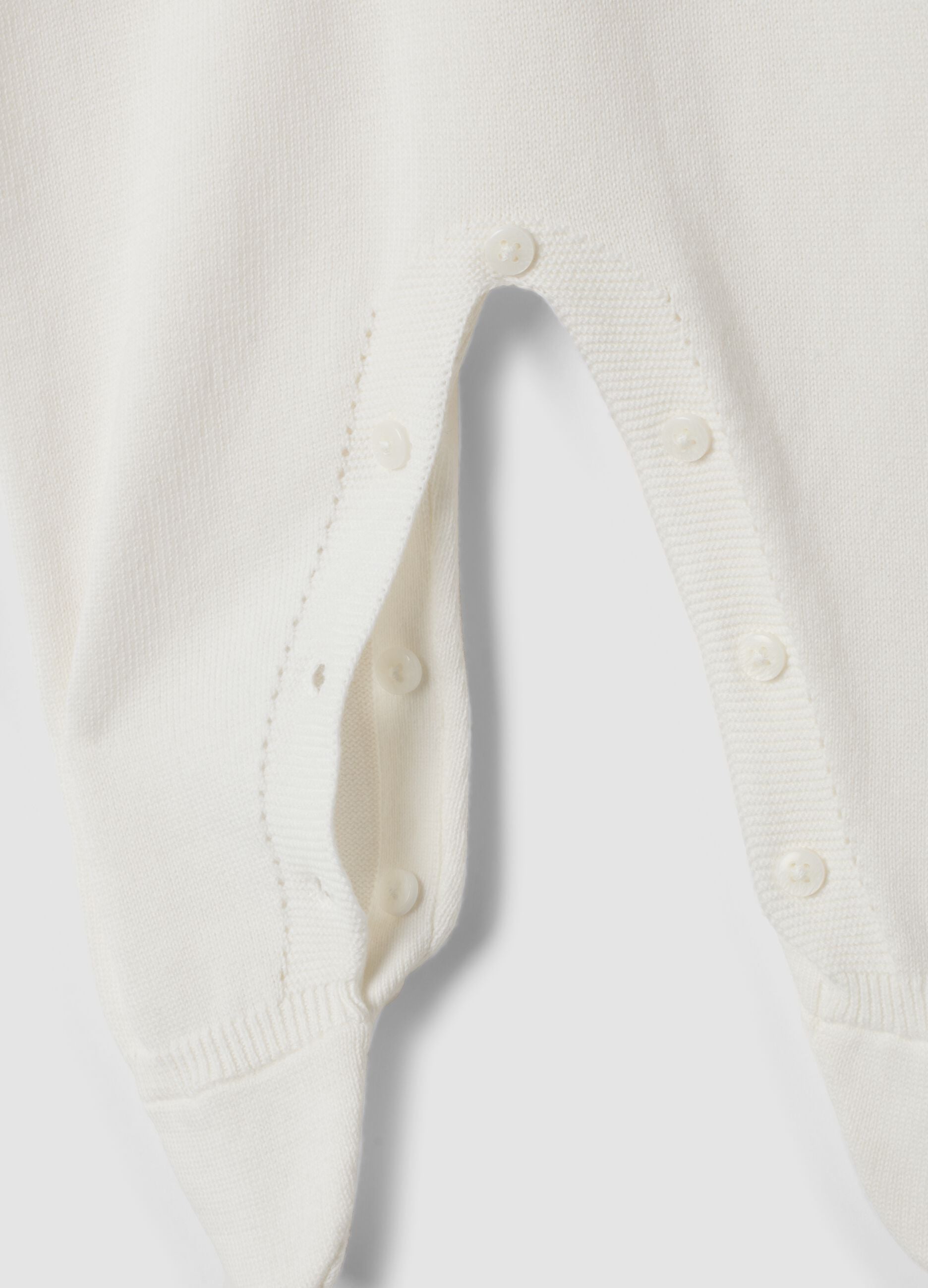 White organic cotton baby sleepsuit with feet